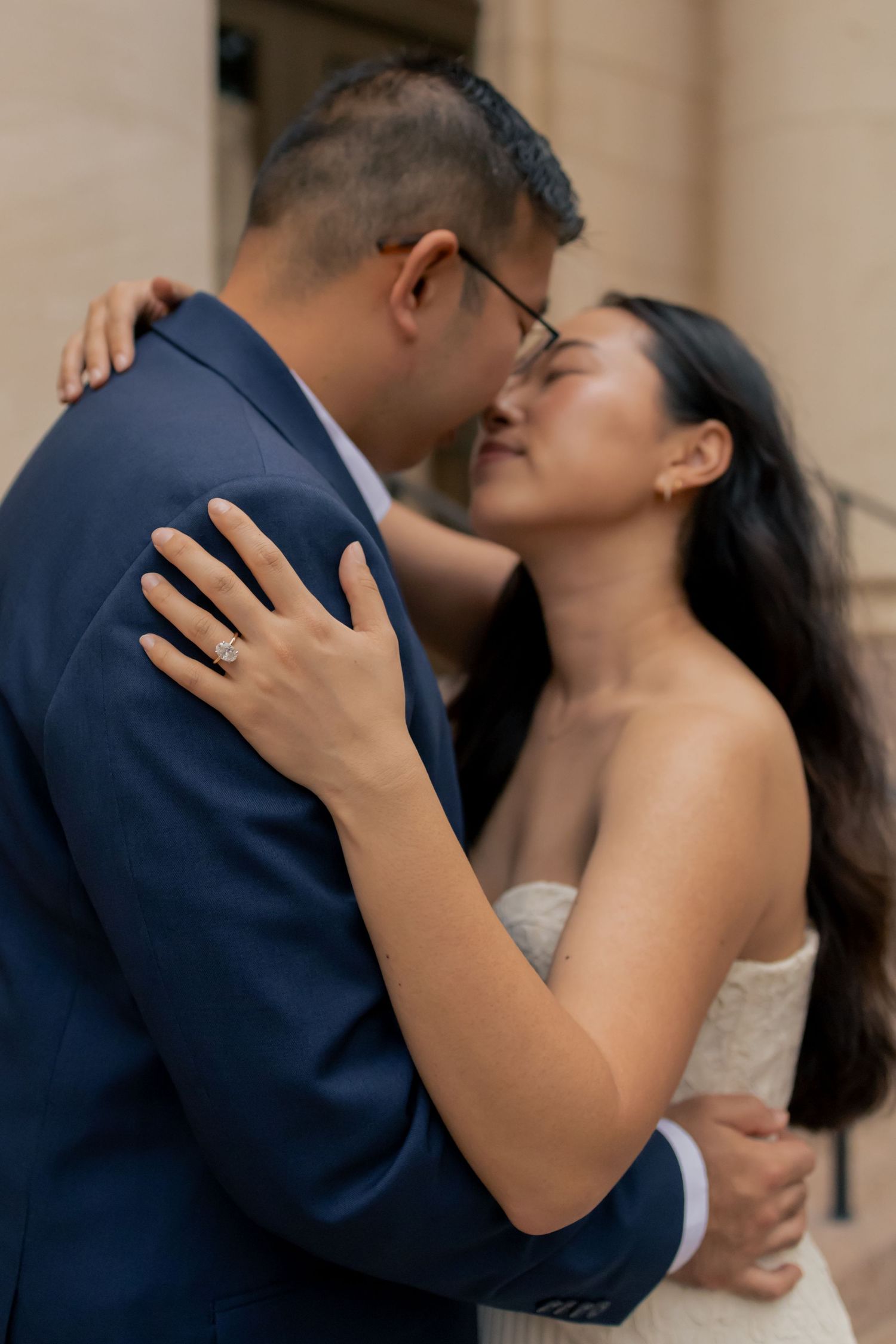 Couple kissing in downtown Austin during a sunrise engagement session