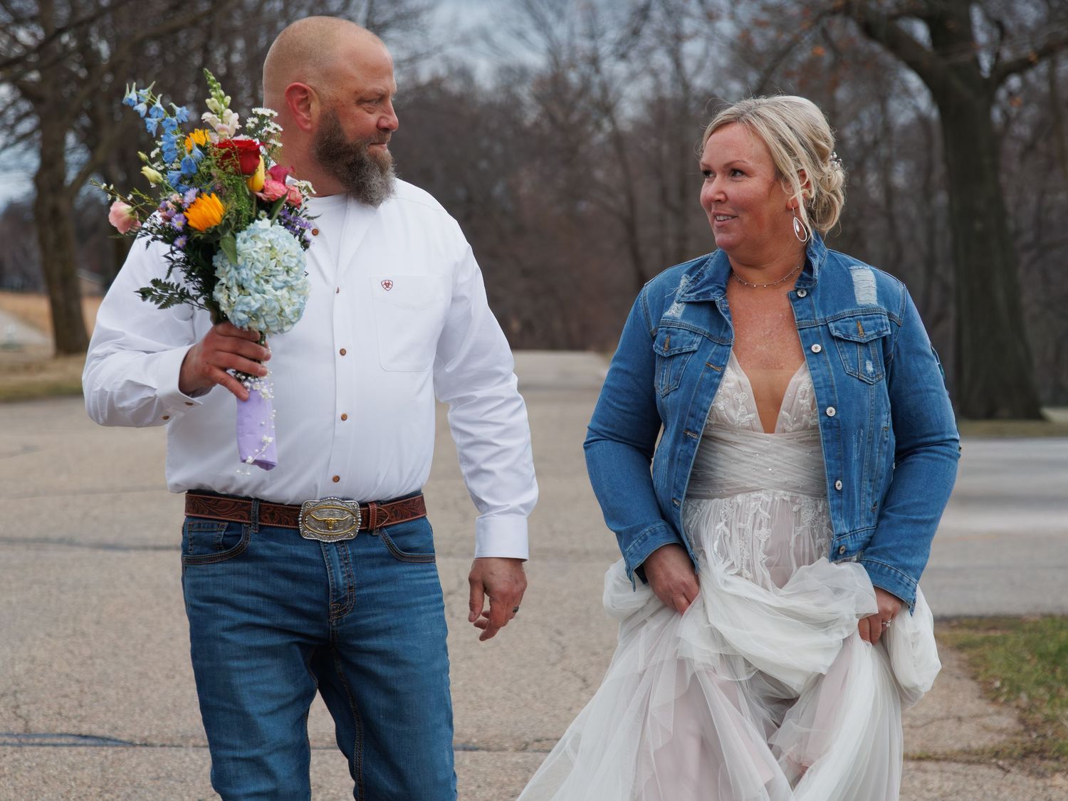 Wisconsin bride and groom walking outdoors after wedding ceremony