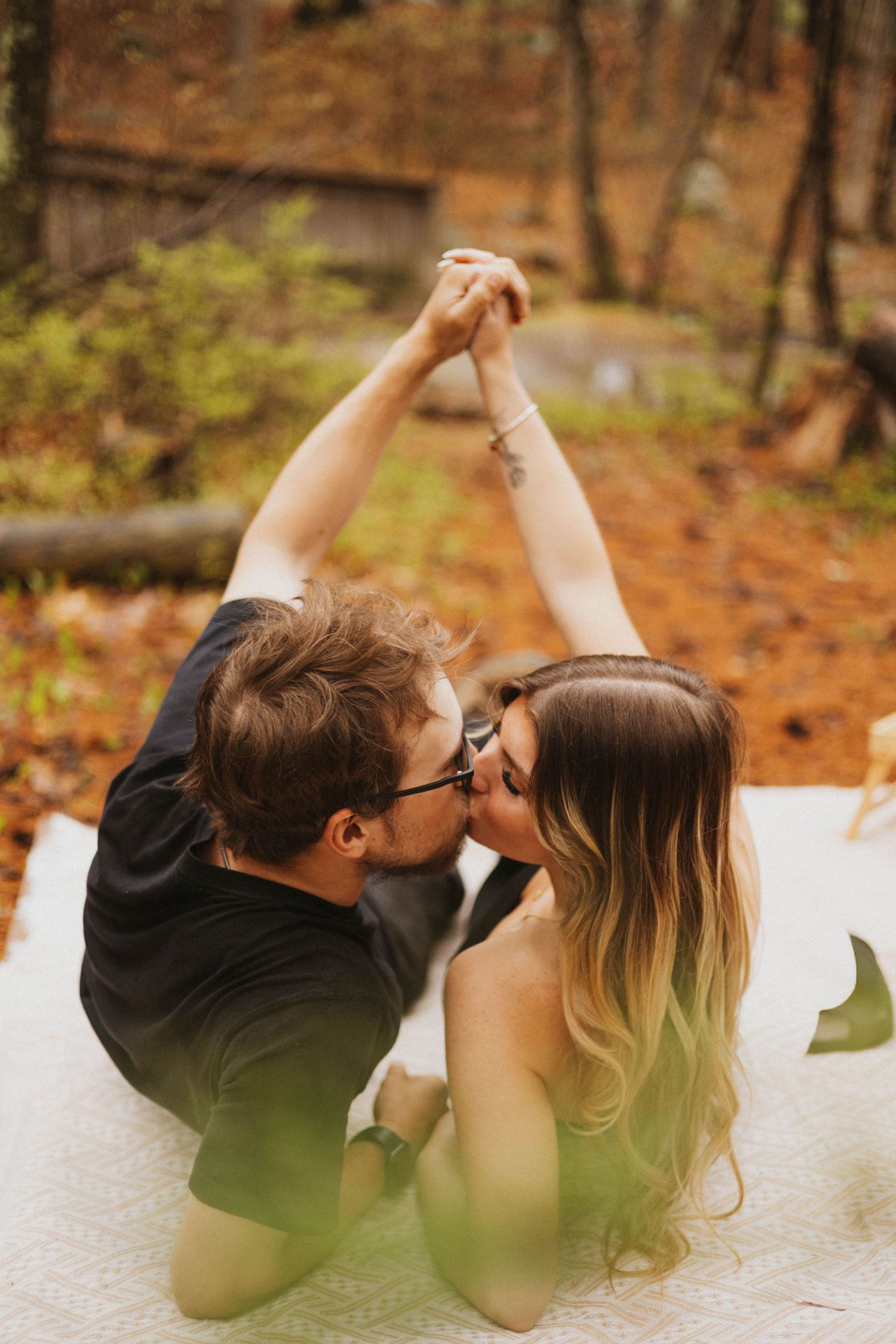 Serenity and her partner laughing together, completely wrapped up in each other.