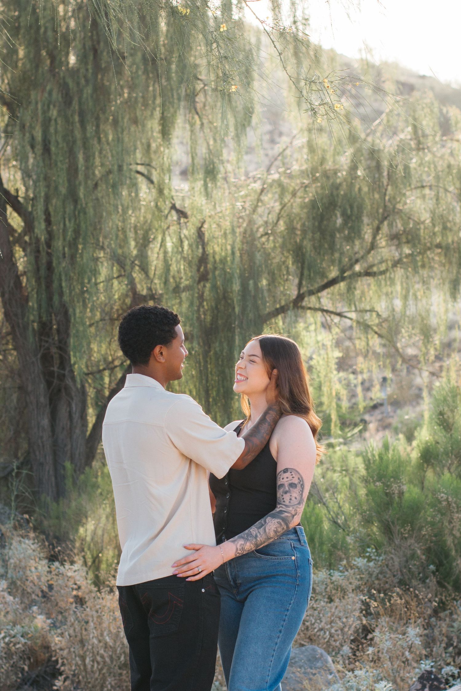 couple photoshoot with greenery background.