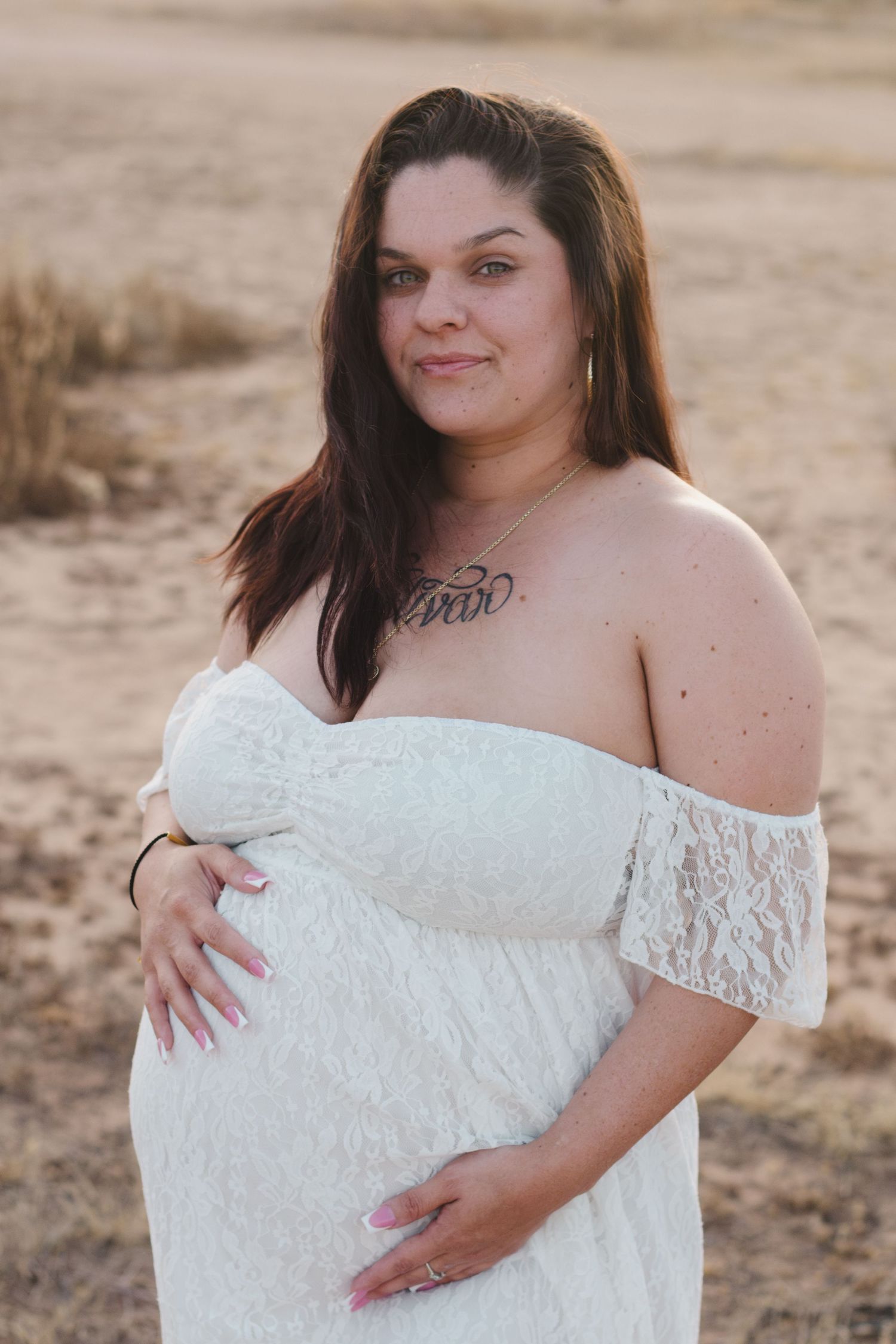 pregnancy photoshoot with arizona mountains in the background