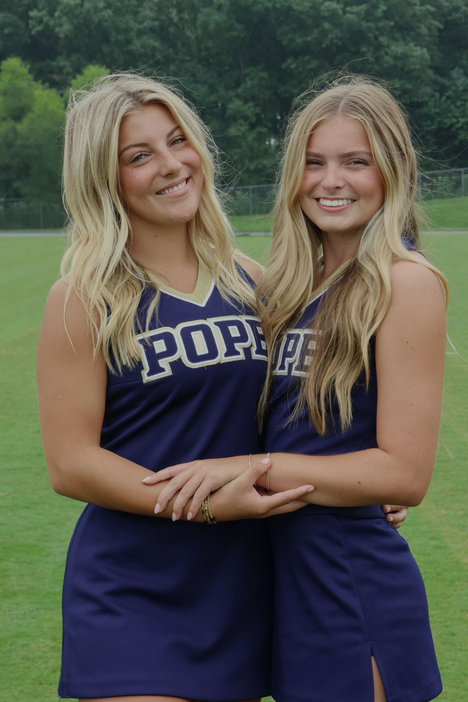 Digital photograph of 2 cheerleaders.