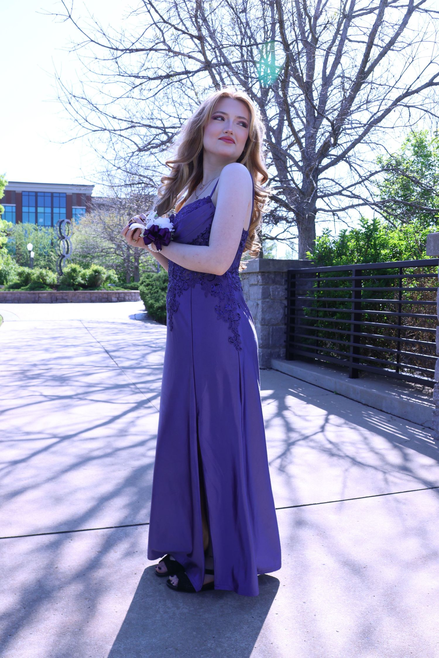 Digital photograph of a young woman looking off to the distance.