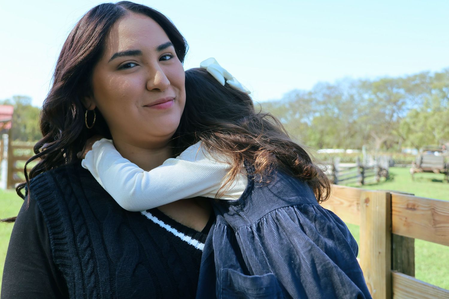 Digital photograph of a mother and daughter.