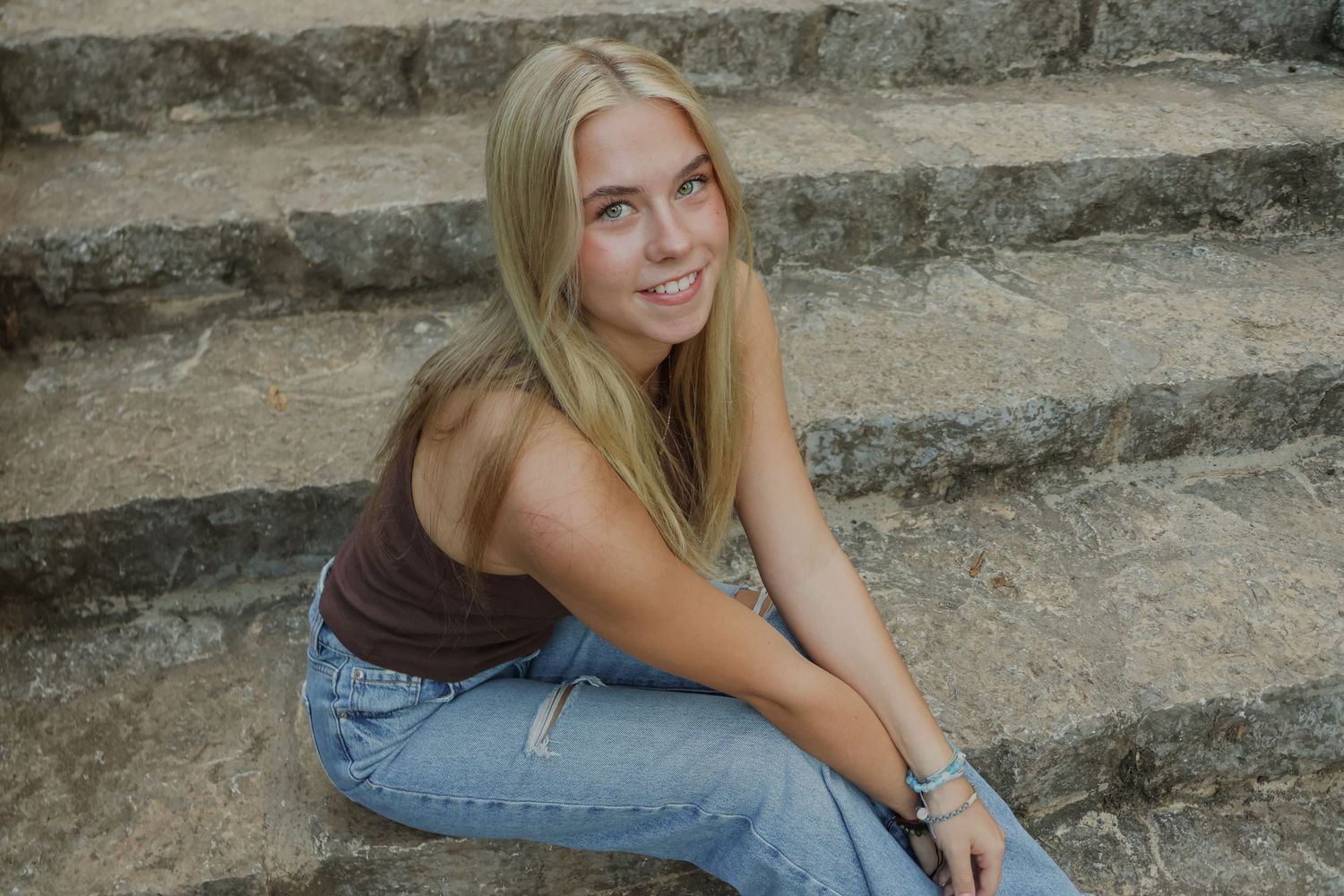 Digital photograph of a young woman smiling.