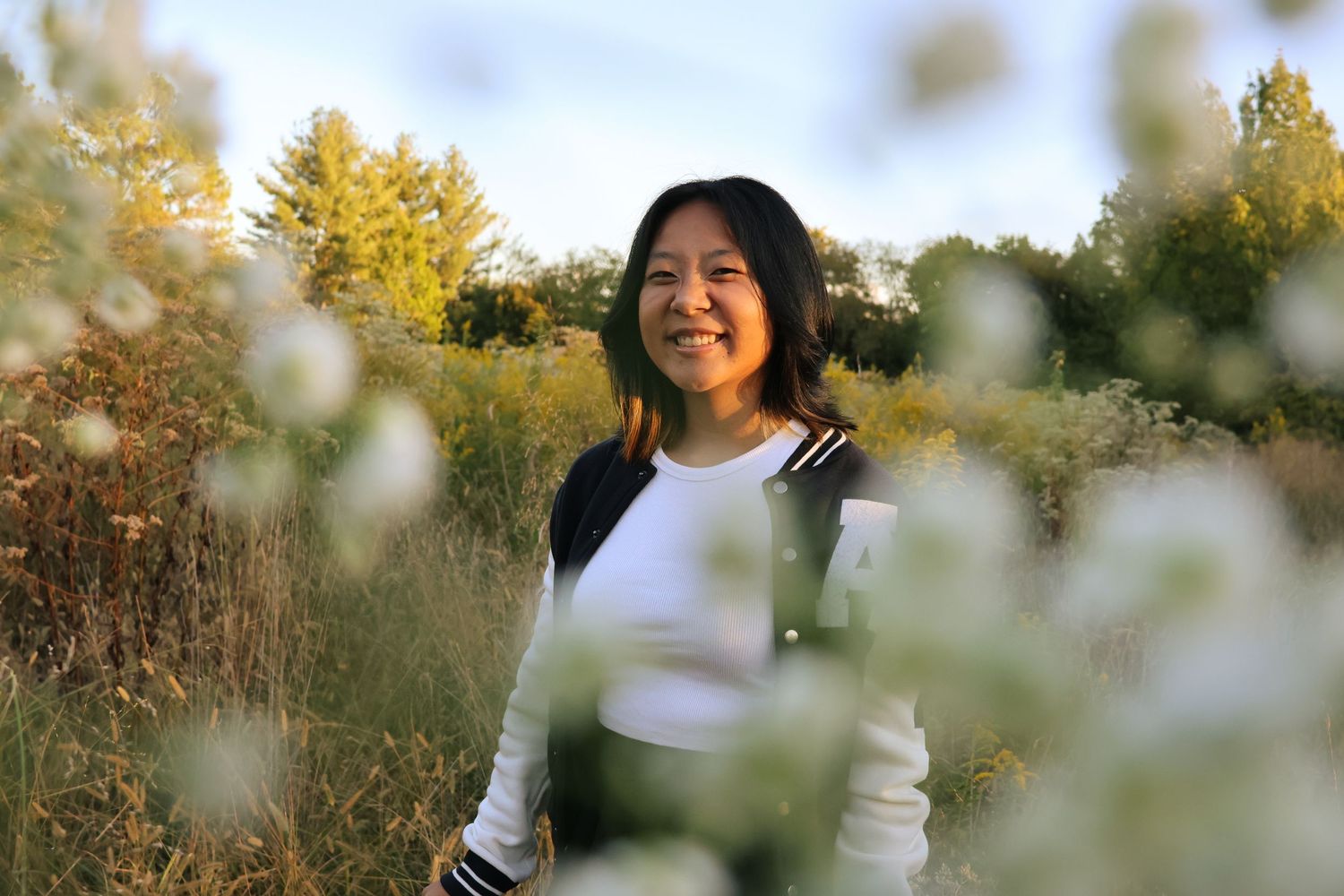 Portrait Photograph of a girl in a flower field.