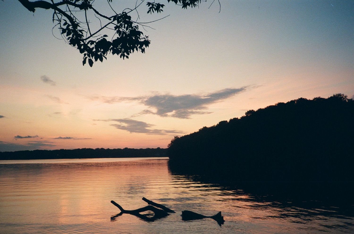 35mm photograph of a colorful sunset at the lake.