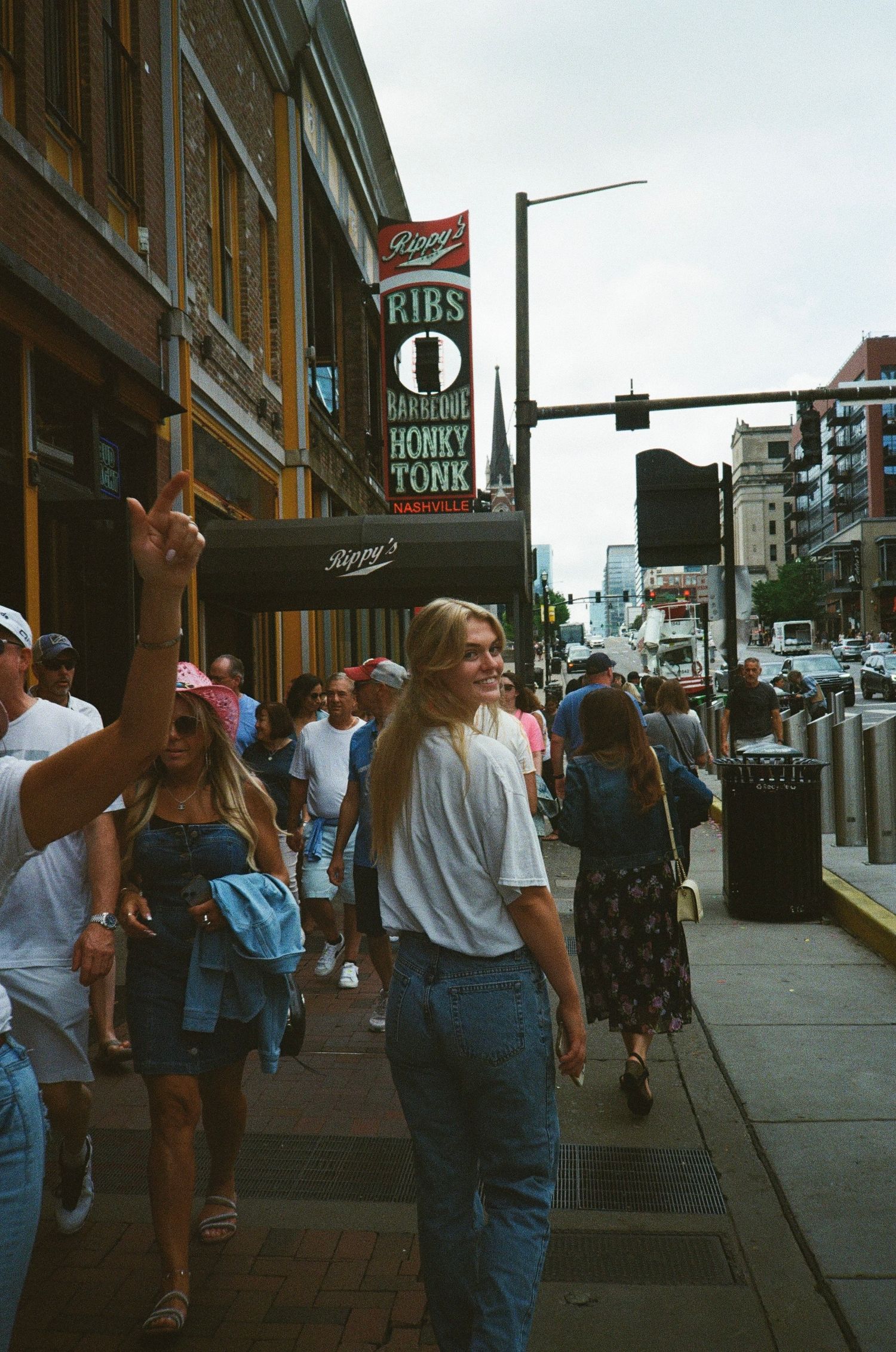 35mm photograph of a young adult (female) in downtown Nashville, TN.