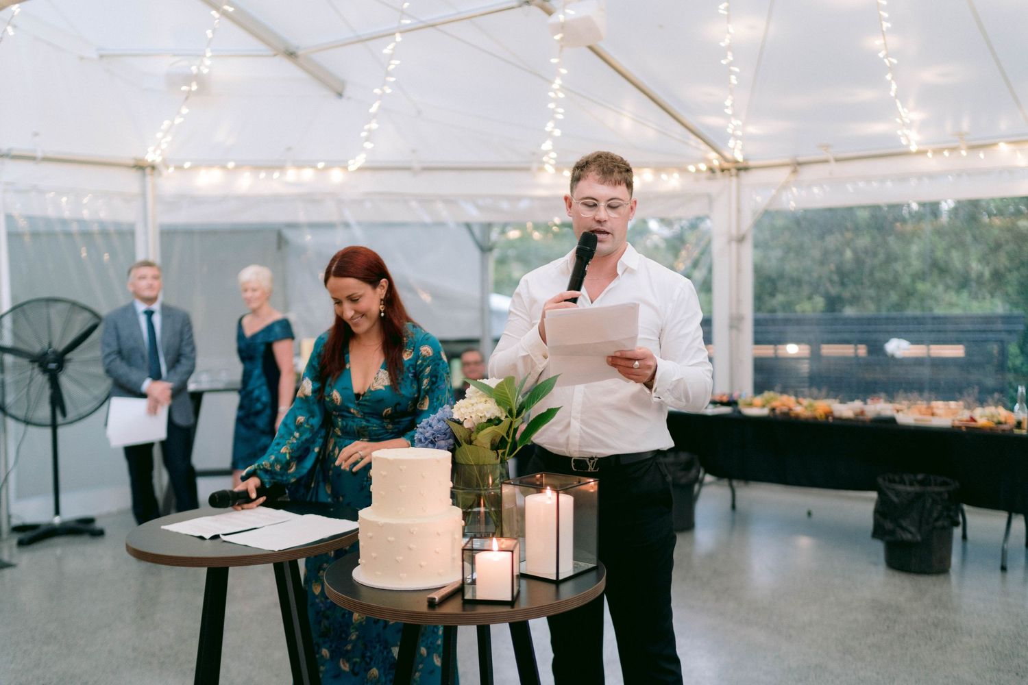 Wedding reception details include white tent setting, string lights, and elegant cake display.