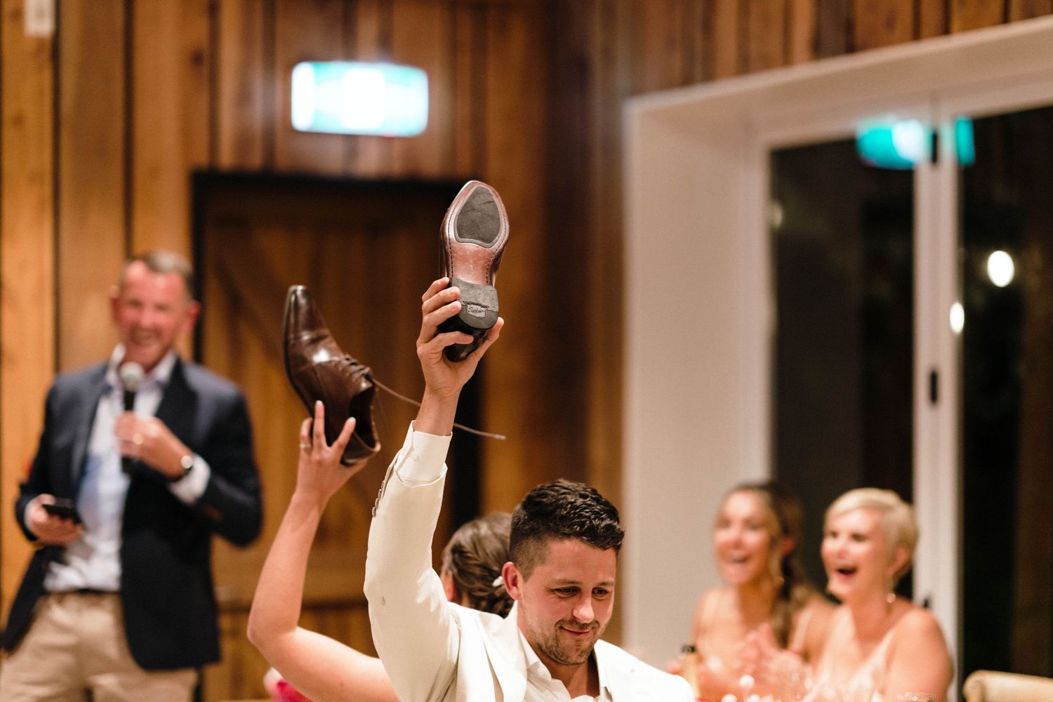Celebratory moment at wedding reception with champagne toast.
