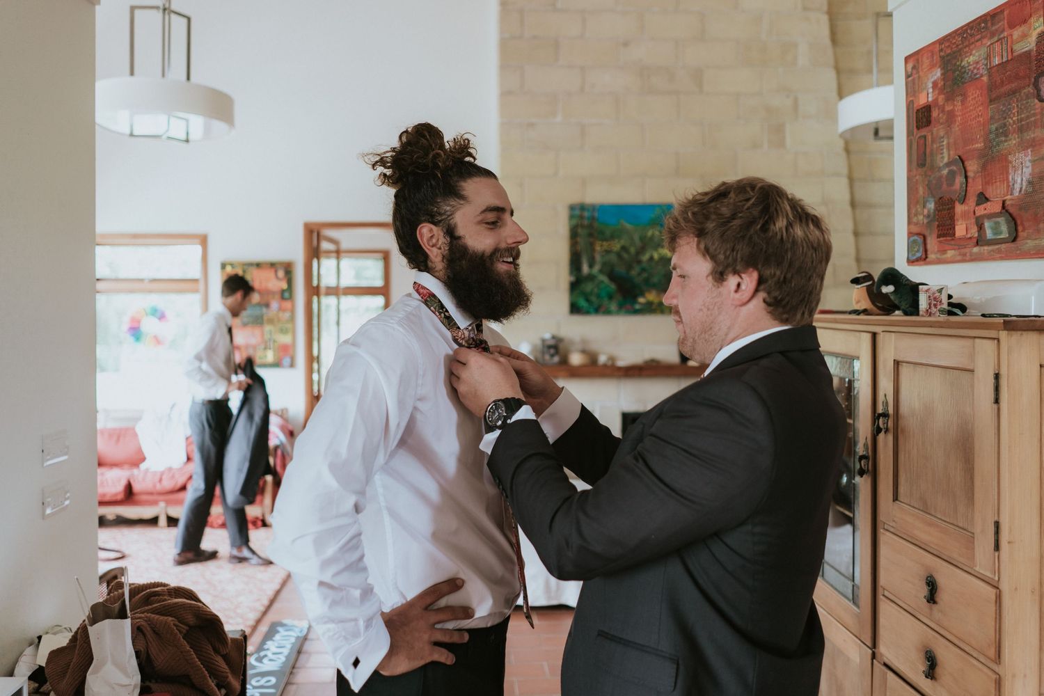 Two people in professional attire engage in a heated discussion in a bright modern office setting.