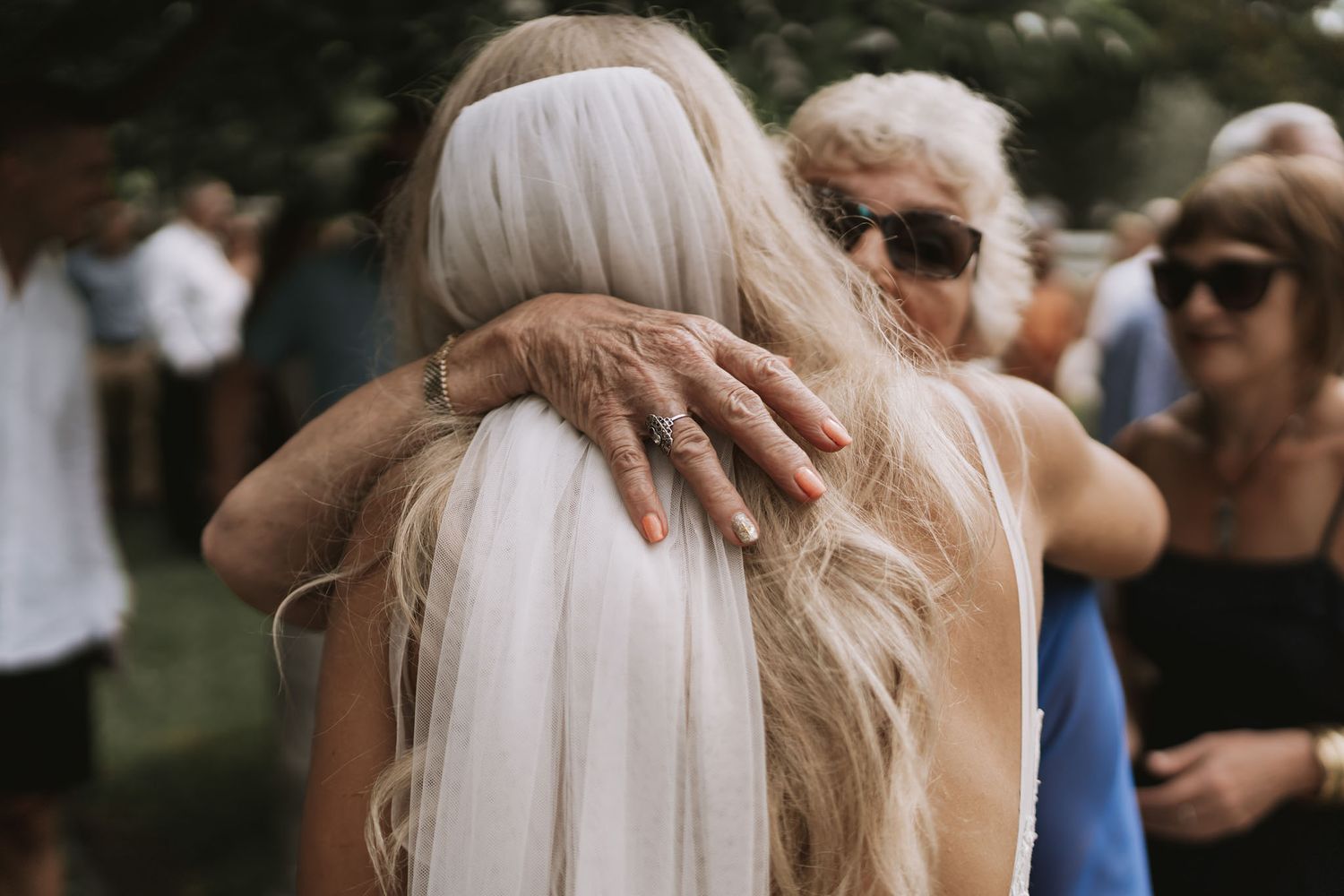A montage of wedding ceremony moments showing couples embracing during outdoor celebrations and receptions.