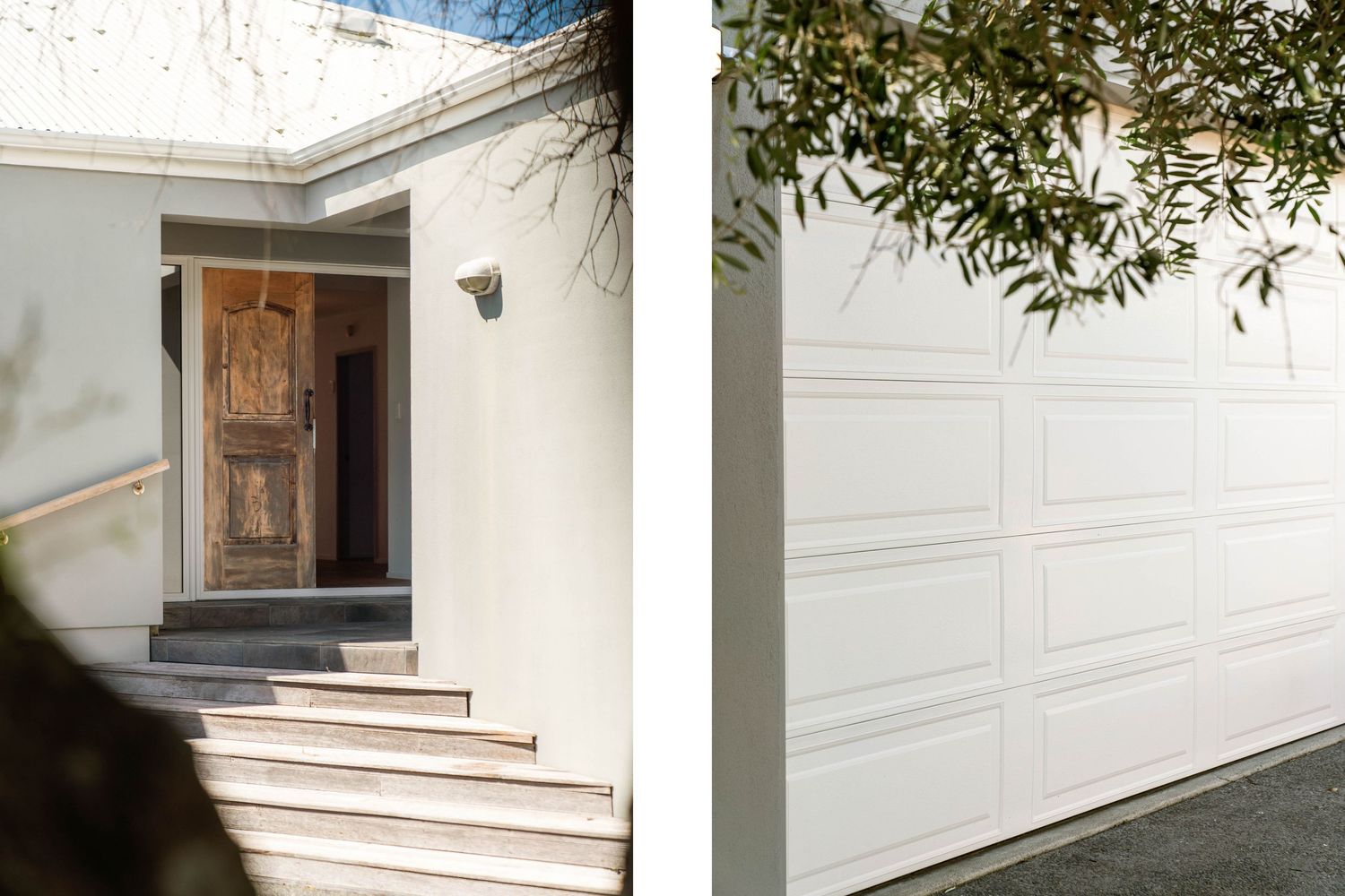 White garage door and entry steps of contemporary home with shadow patterns.
