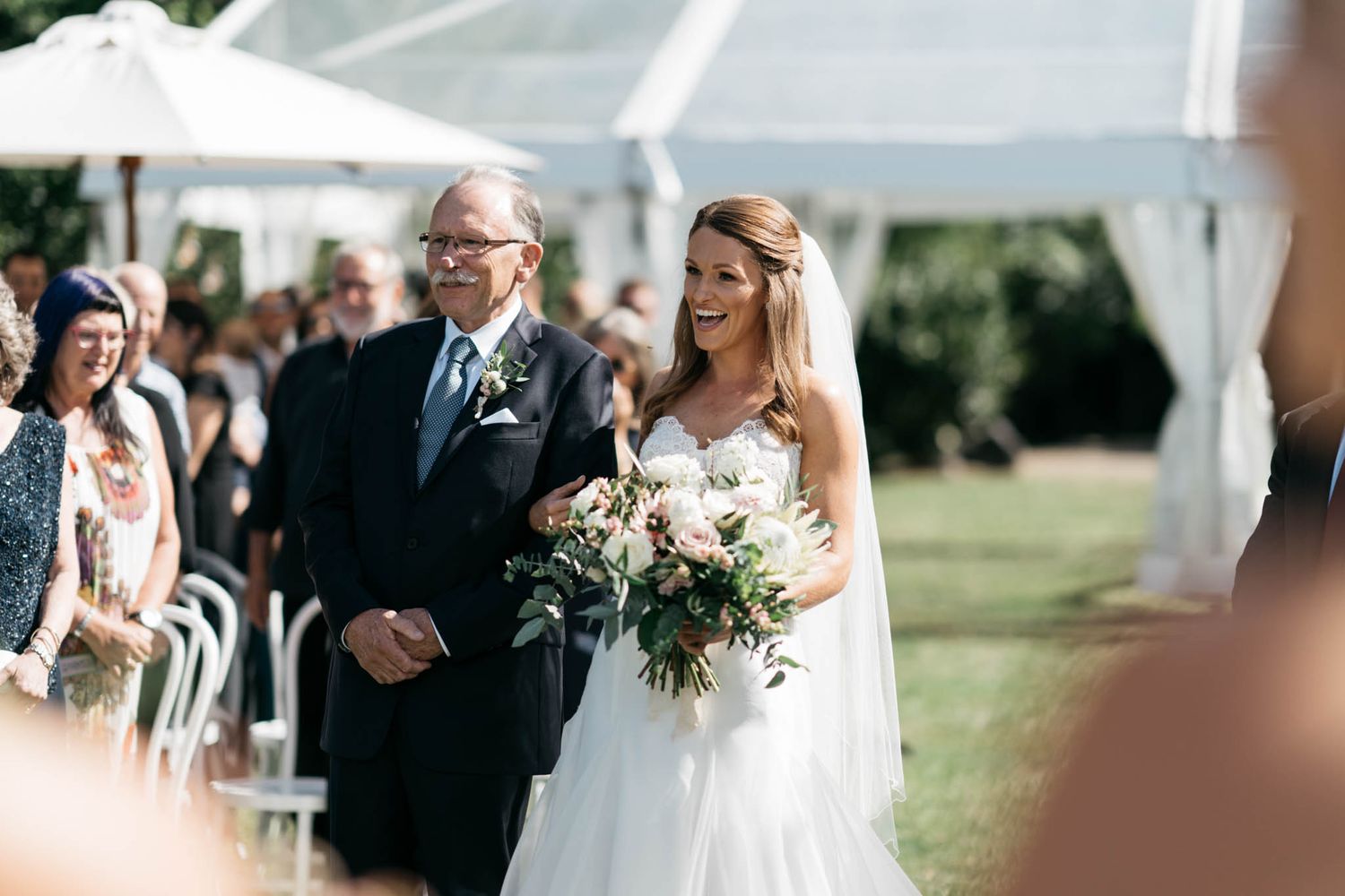 A collection of candid wedding ceremony moments showing guests, flowers, and outdoor celebrations at an elegant venue.