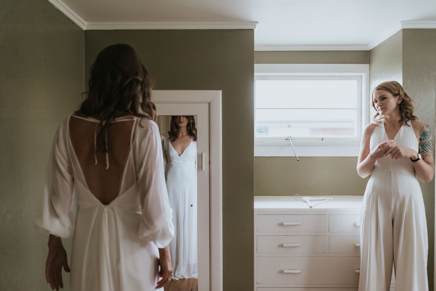 A sequence of artistic bridal boudoir photos showing a person in a white dress by a window in soft natural light.