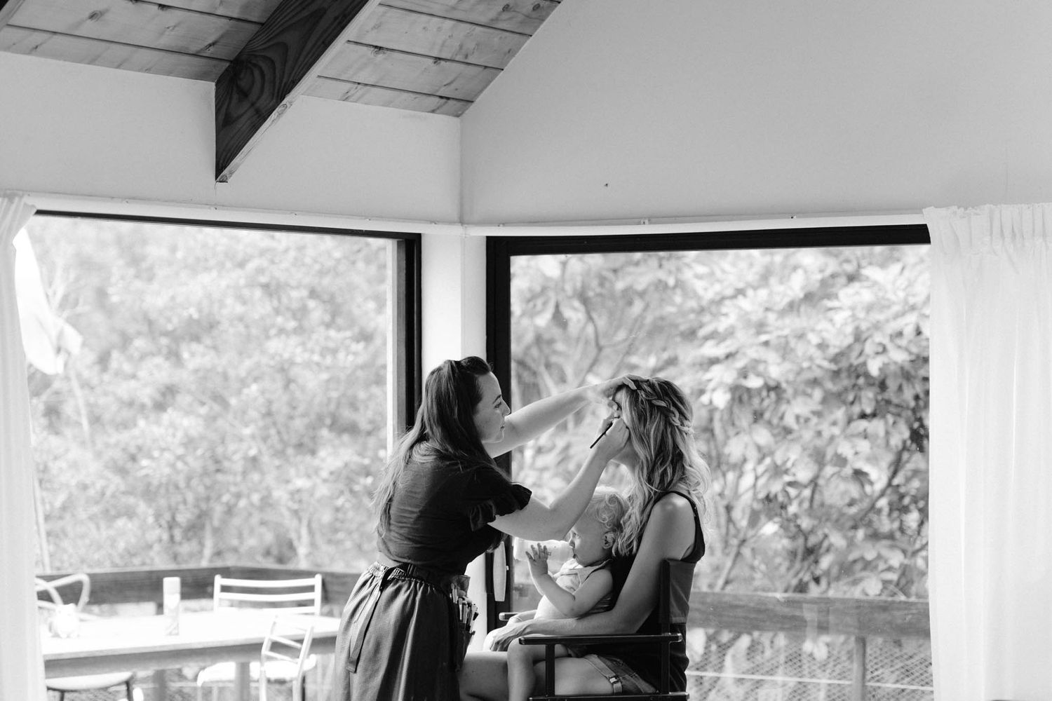 Several black and white photographs displayed in a series show outdoor scenes and casual moments from daily life.