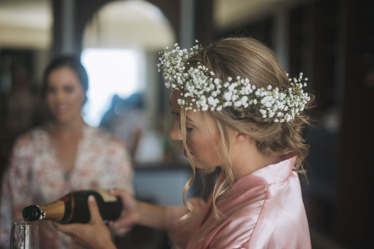 Series of mirrored reflections showing a bride with baby's breath floral crown getting ready for her wedding.