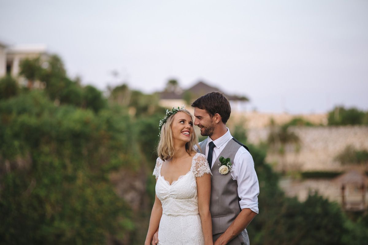 A romantic wedding couple photoshoot in a scenic outdoor setting.