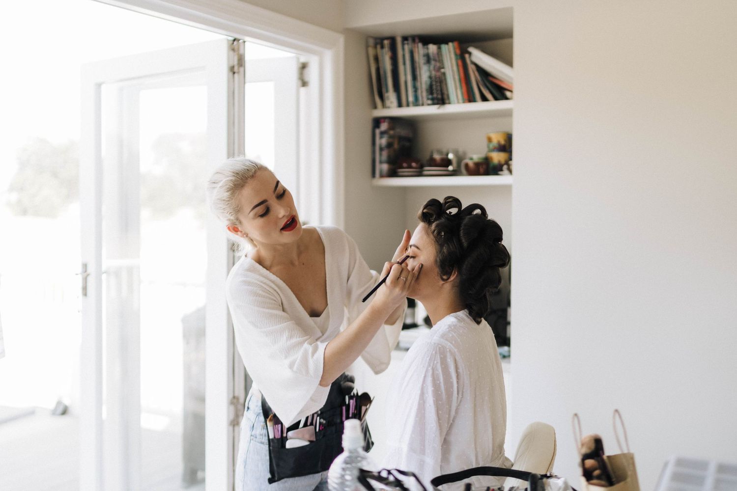 Candid moments captured in a bright living room showing playful interactions indoors.