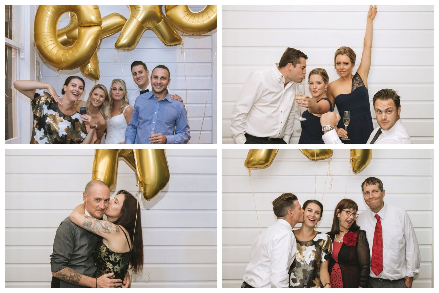 Office celebration with gold balloon decorations against white brick wall during a festive corporate event.