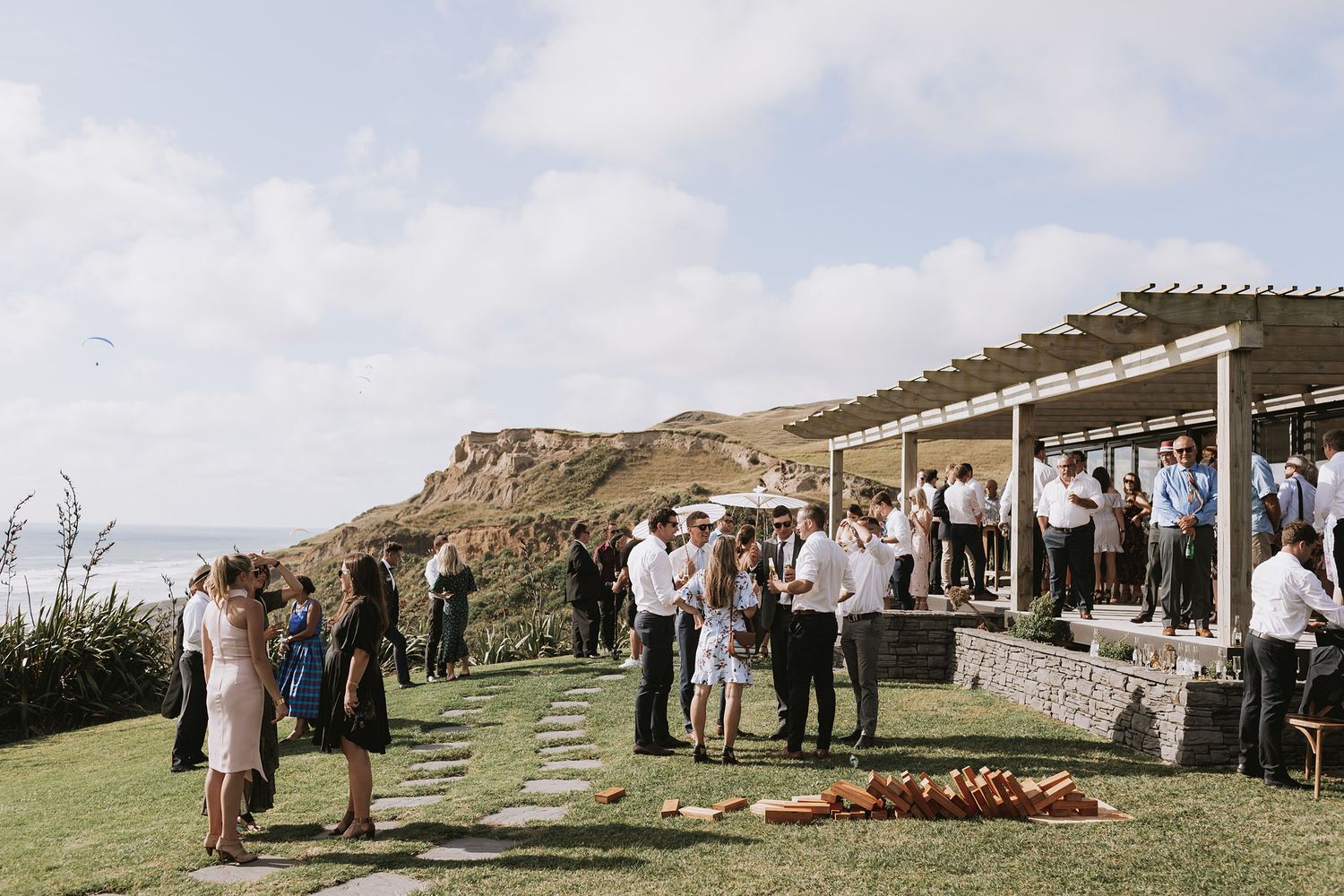 Wedding guests gather outdoors for outdoor ceremonies at scenic mountain venues with natural desert landscapes.