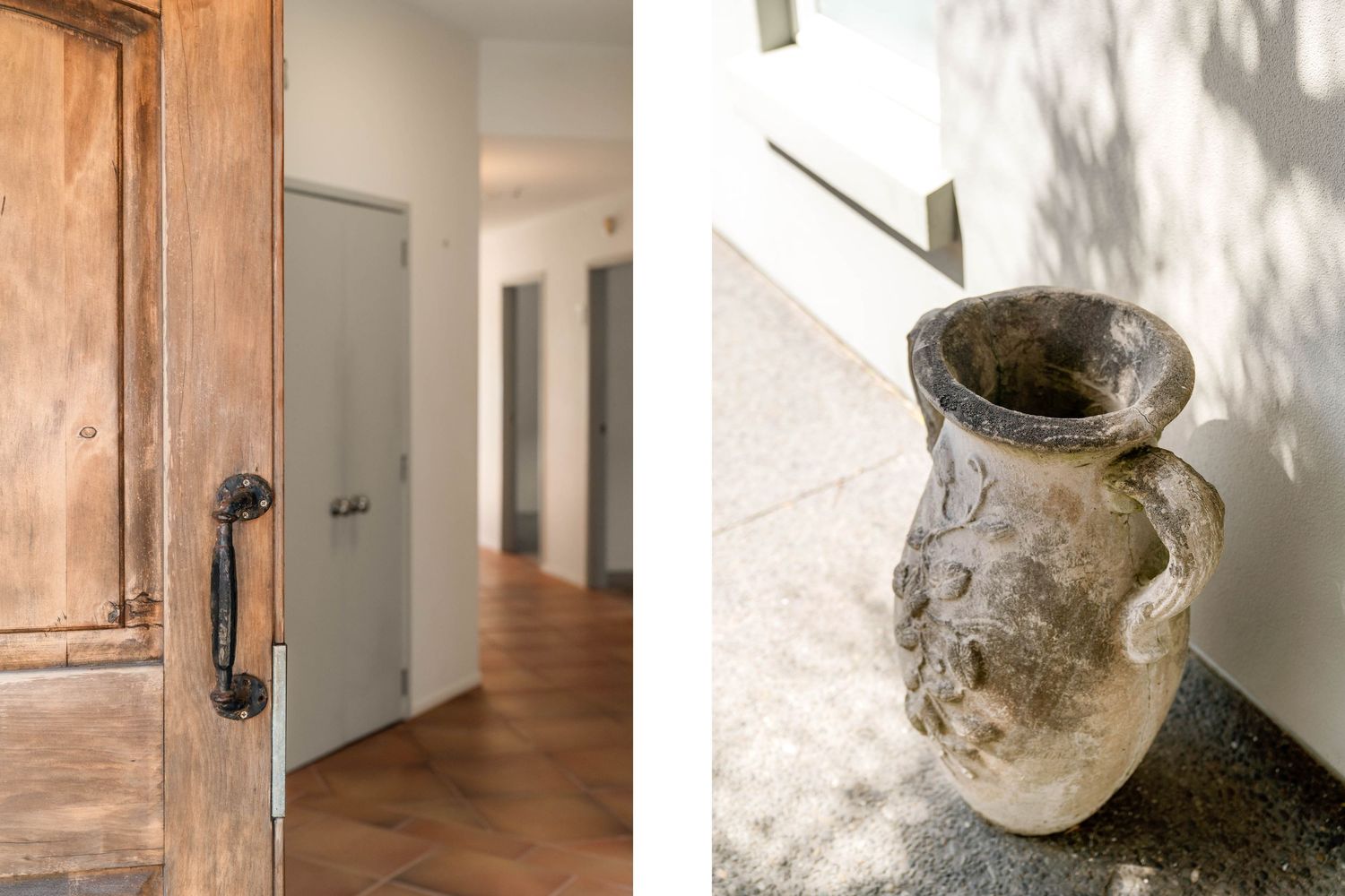 Rustic wooden door and hallway interior next to an antique ceramic vase.