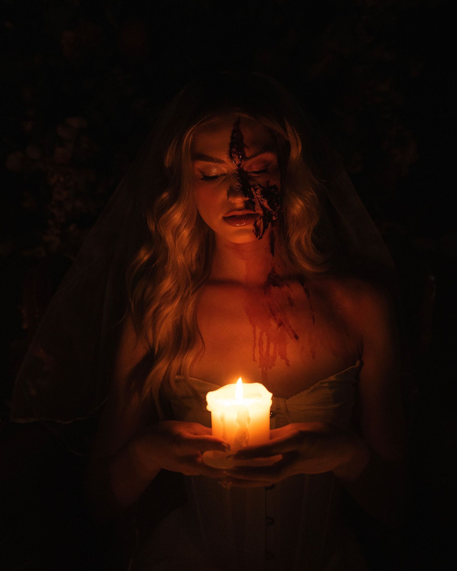 A glowing candle flame creates an atmospheric silhouette against a dark background in multiple sequential frames.