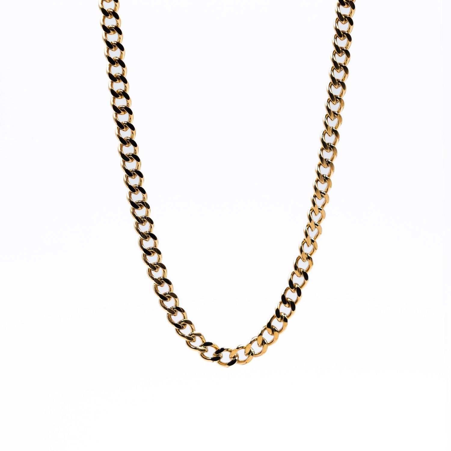 A classic gold-toned curb chain necklace with uniform links displayed against a plain white background.