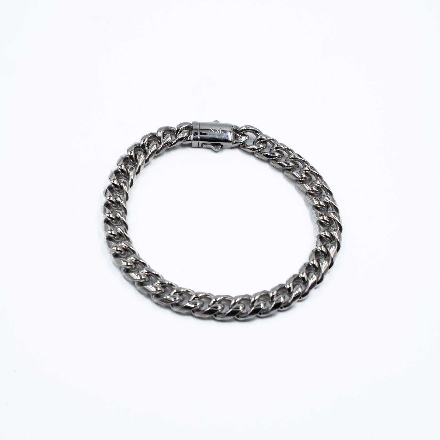 Sleek stainless steel curb chain bracelet with polished finish and secure clasp displayed on white background.