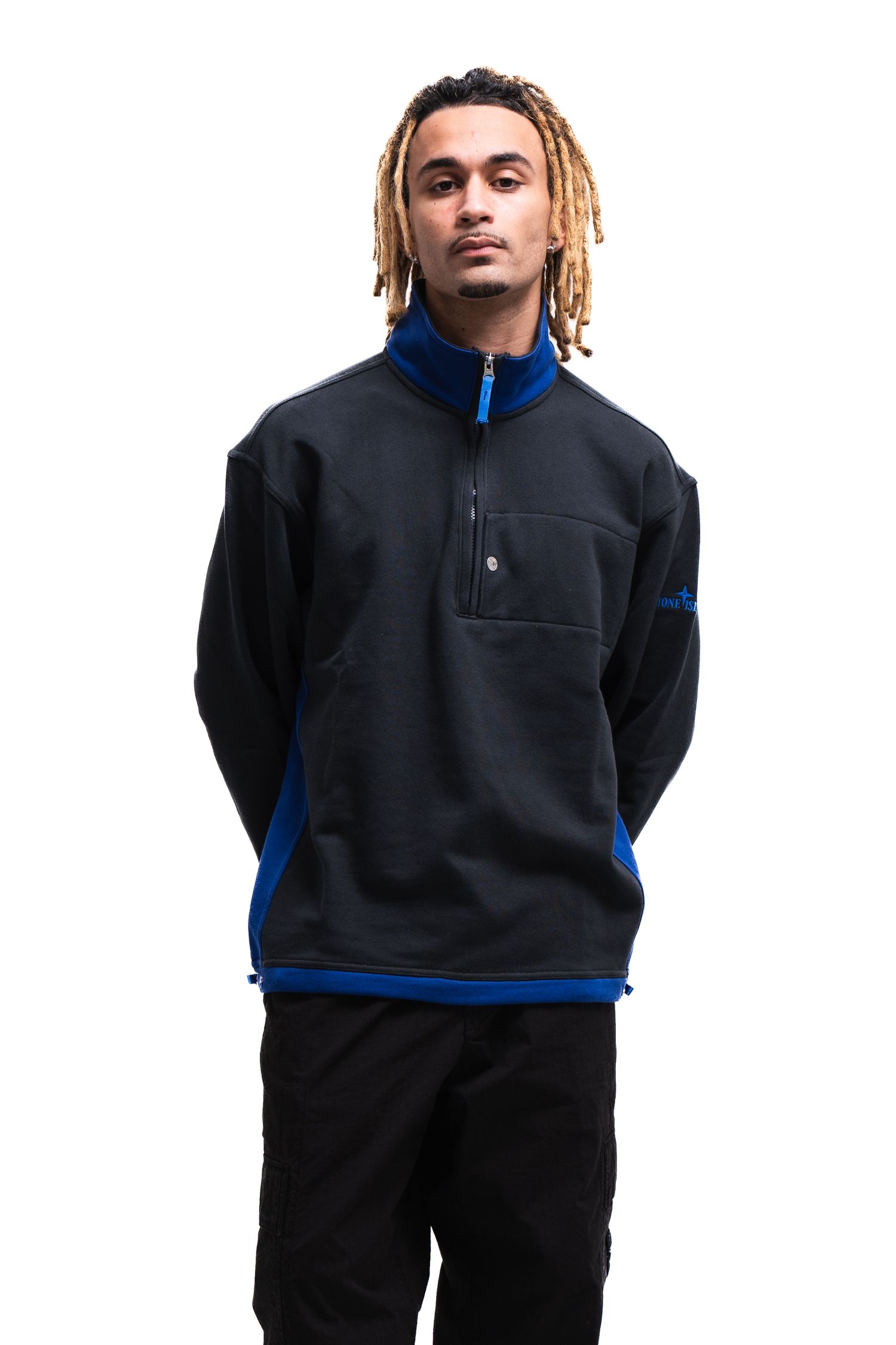 Black fleece pullover with blue accents and quarter-zip design shown on model against white background.