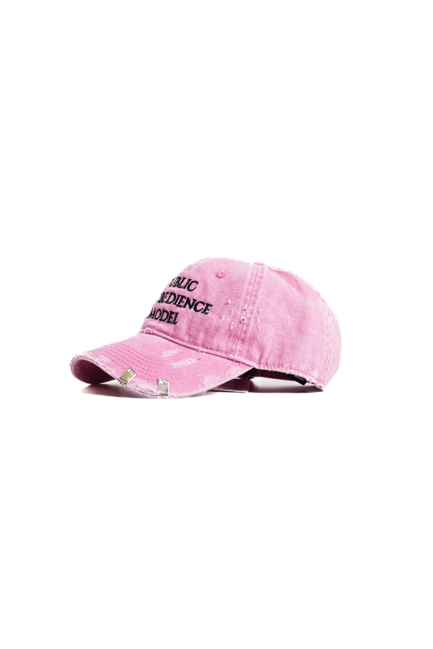 Distressed pink baseball cap with dark text embroidery.