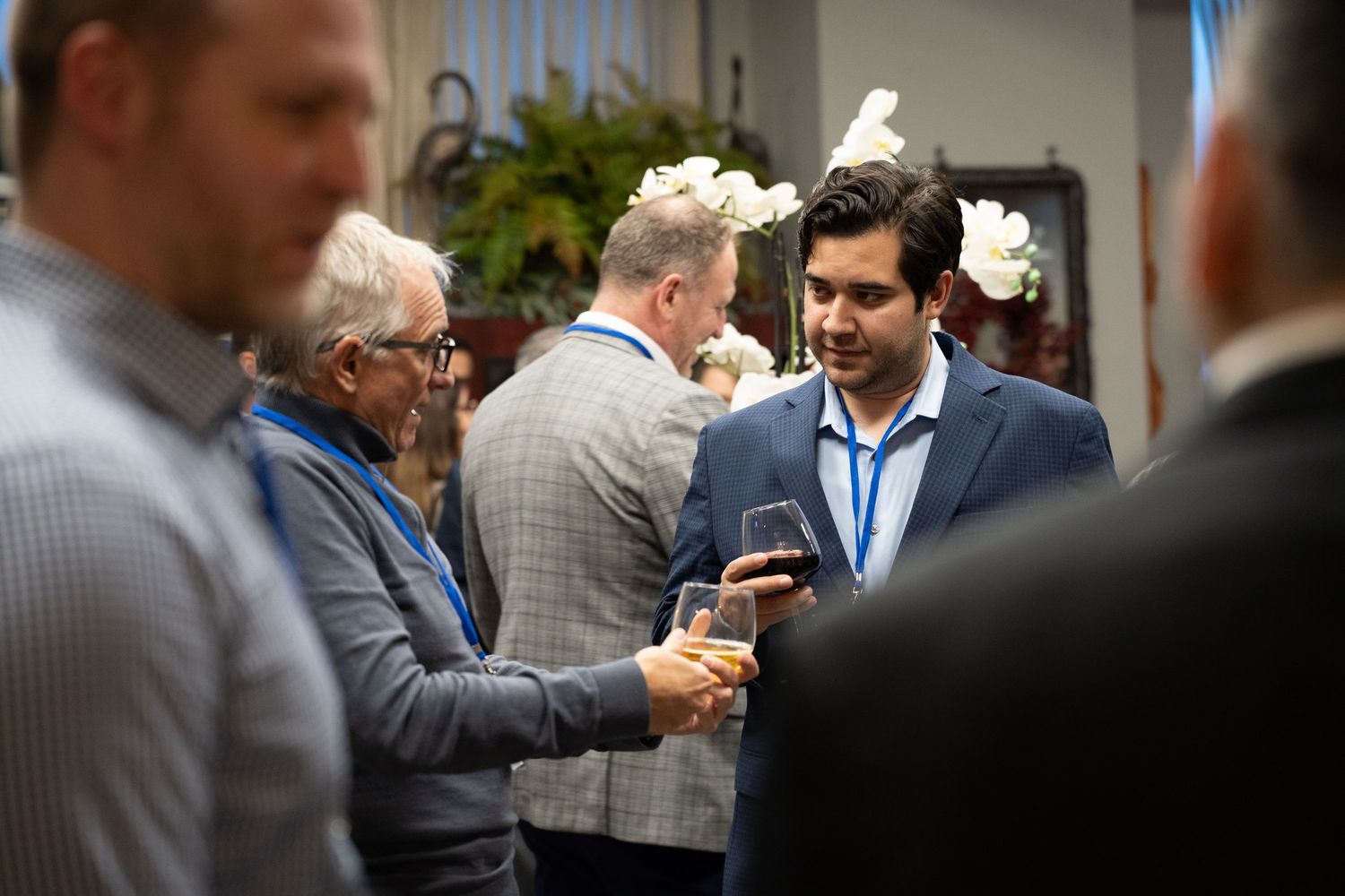 people smiling at a corporate event