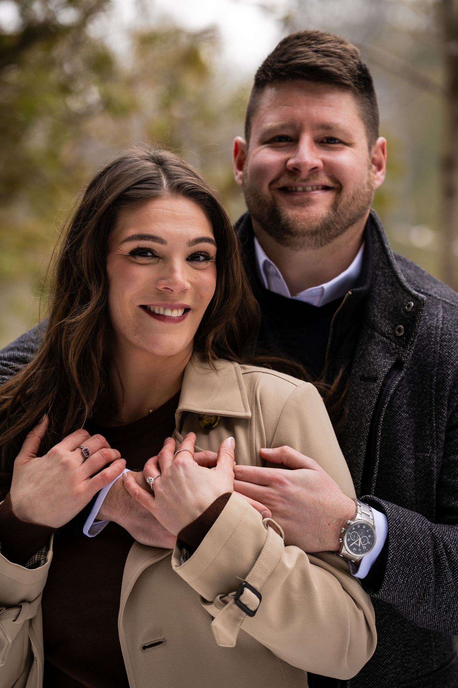 women and man pose together