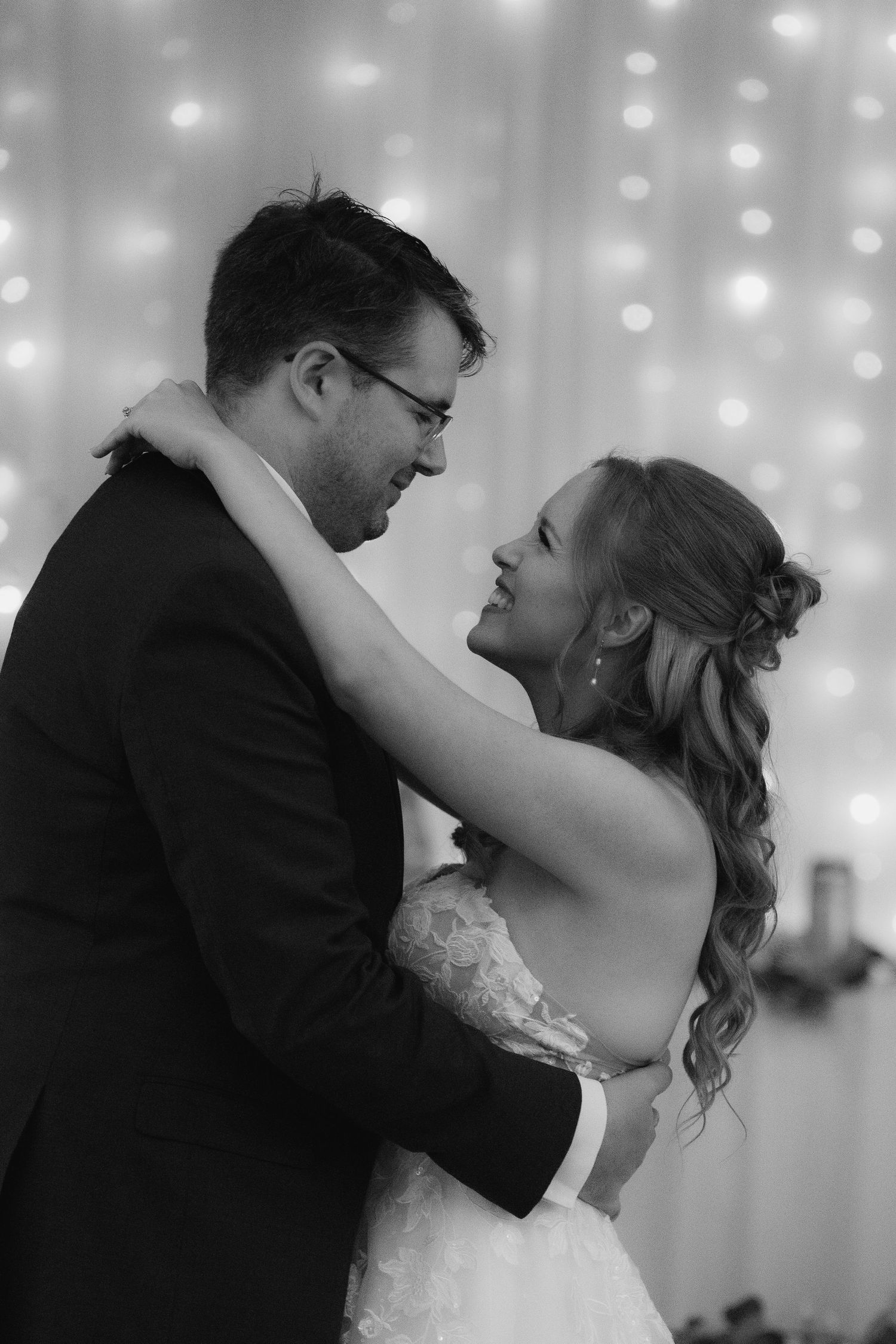 bride and groom in black and white