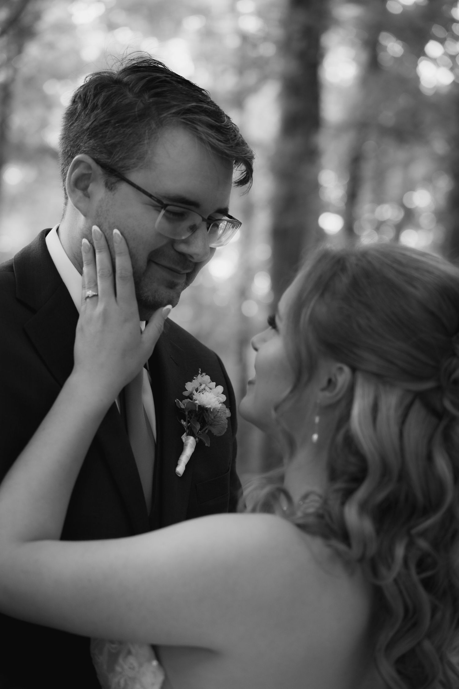 bride and goom look lovingly at each other