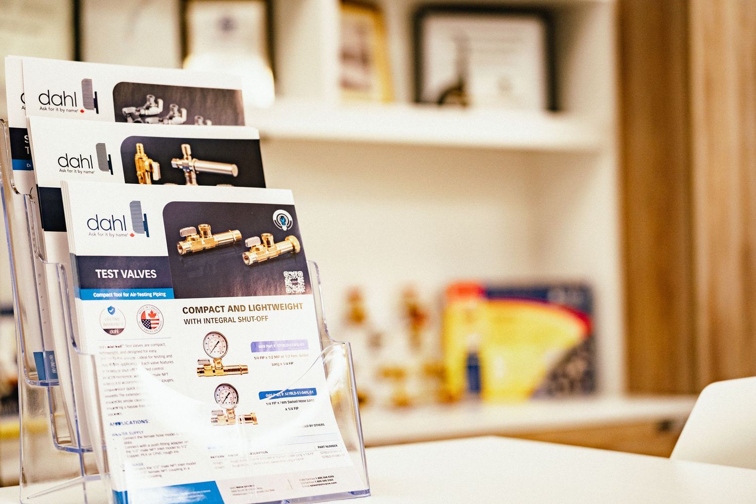 Office shelves displaying organized business documents and folders in a modern workspace setting.