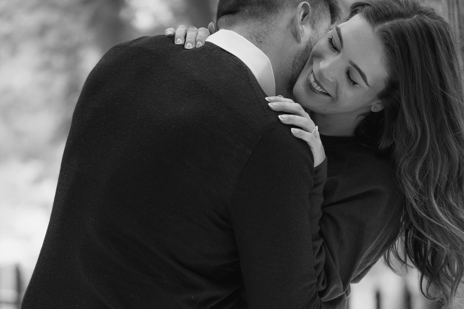 Balck and white photos of women and man embracing