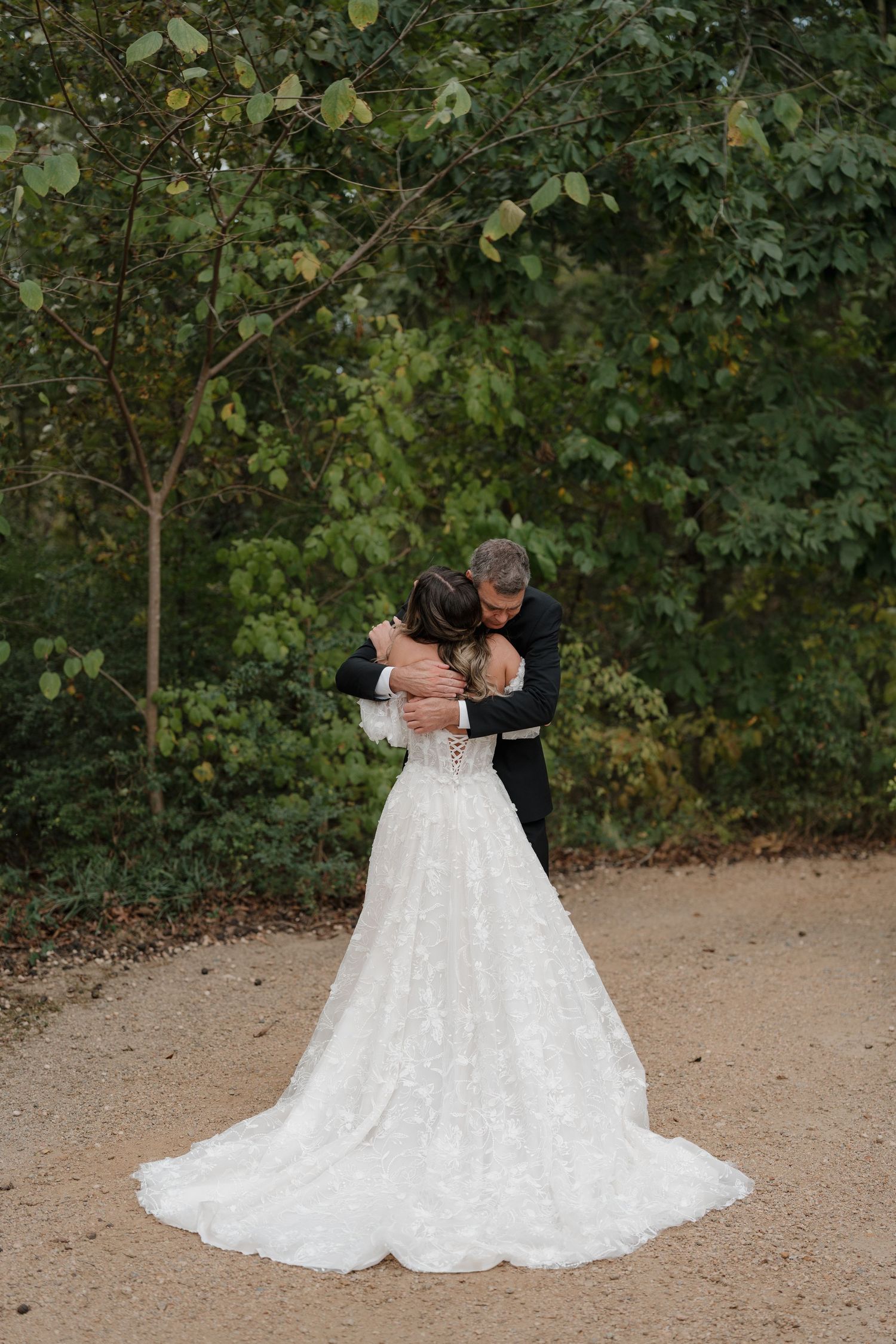A romantic wedding moment captured in a series of photos showing a couple embracing outdoors with a flowing white dress.