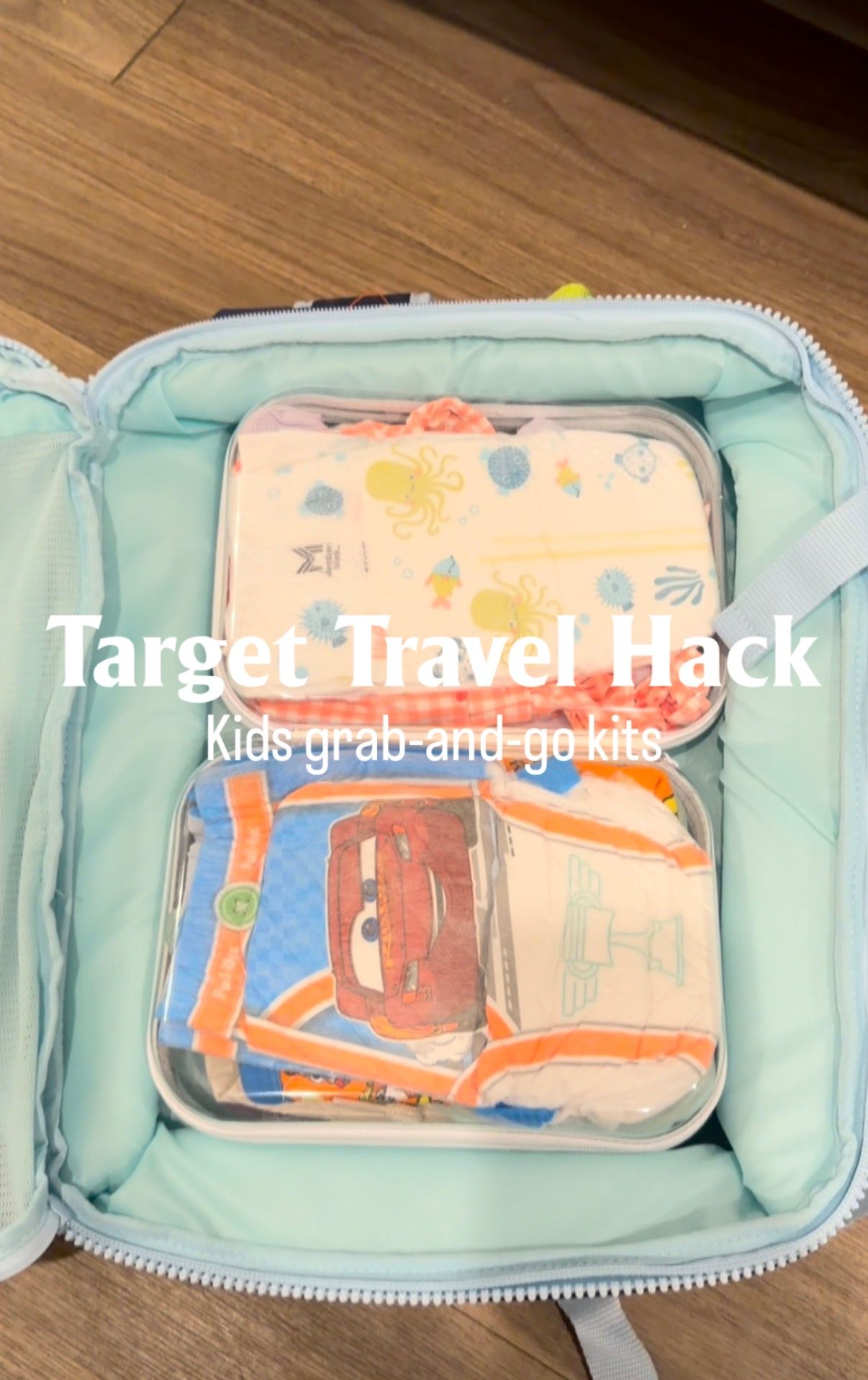Target travel hack showing kids grab-and-go kits packed neatly in a mint green travel case with colorful pouches.