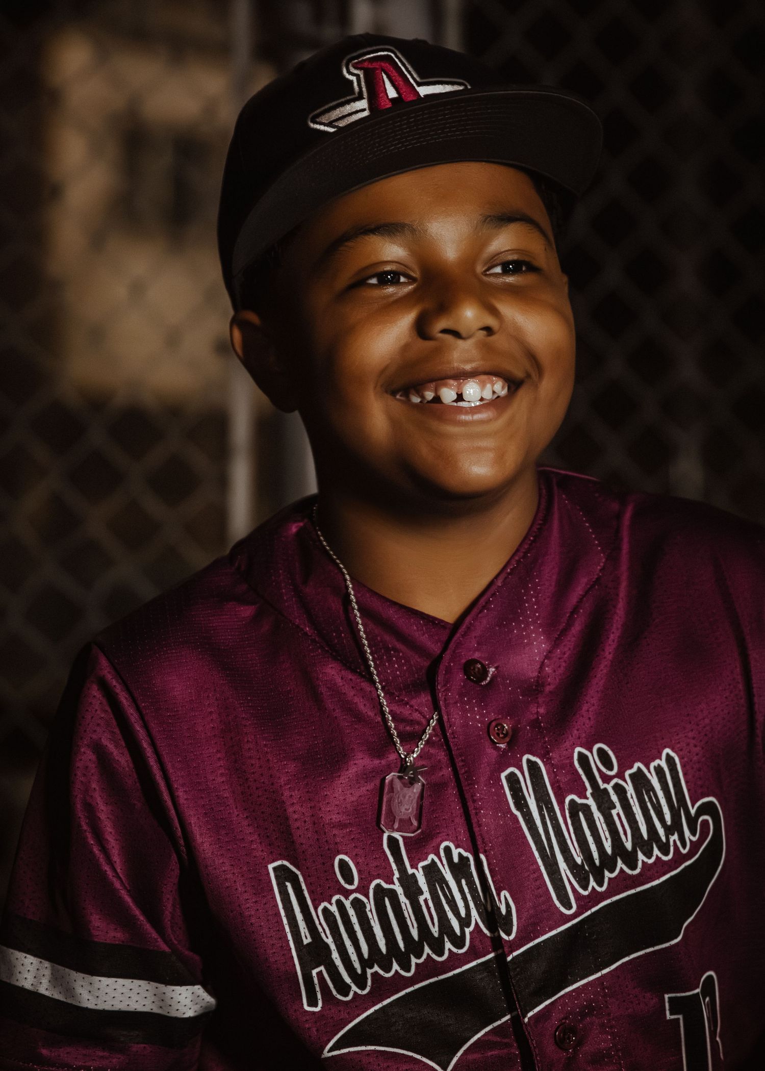 Young person in purple hoodie showing different expressions in sequence of photos.