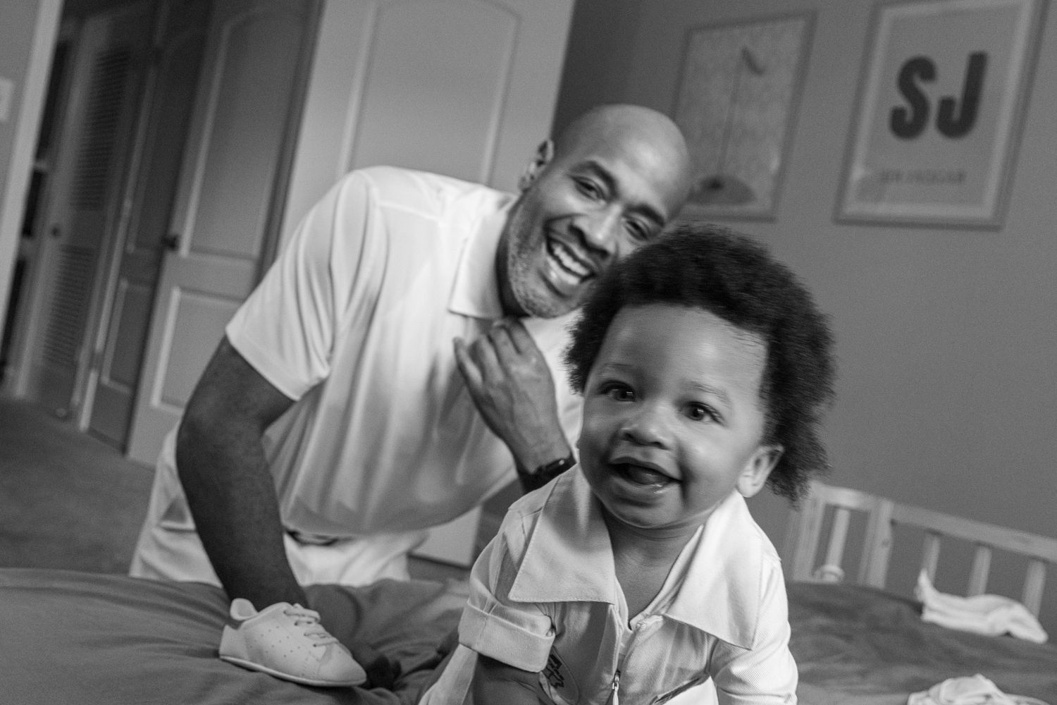 A group of people in a medical setting share joyful moments together during a healthcare visit.