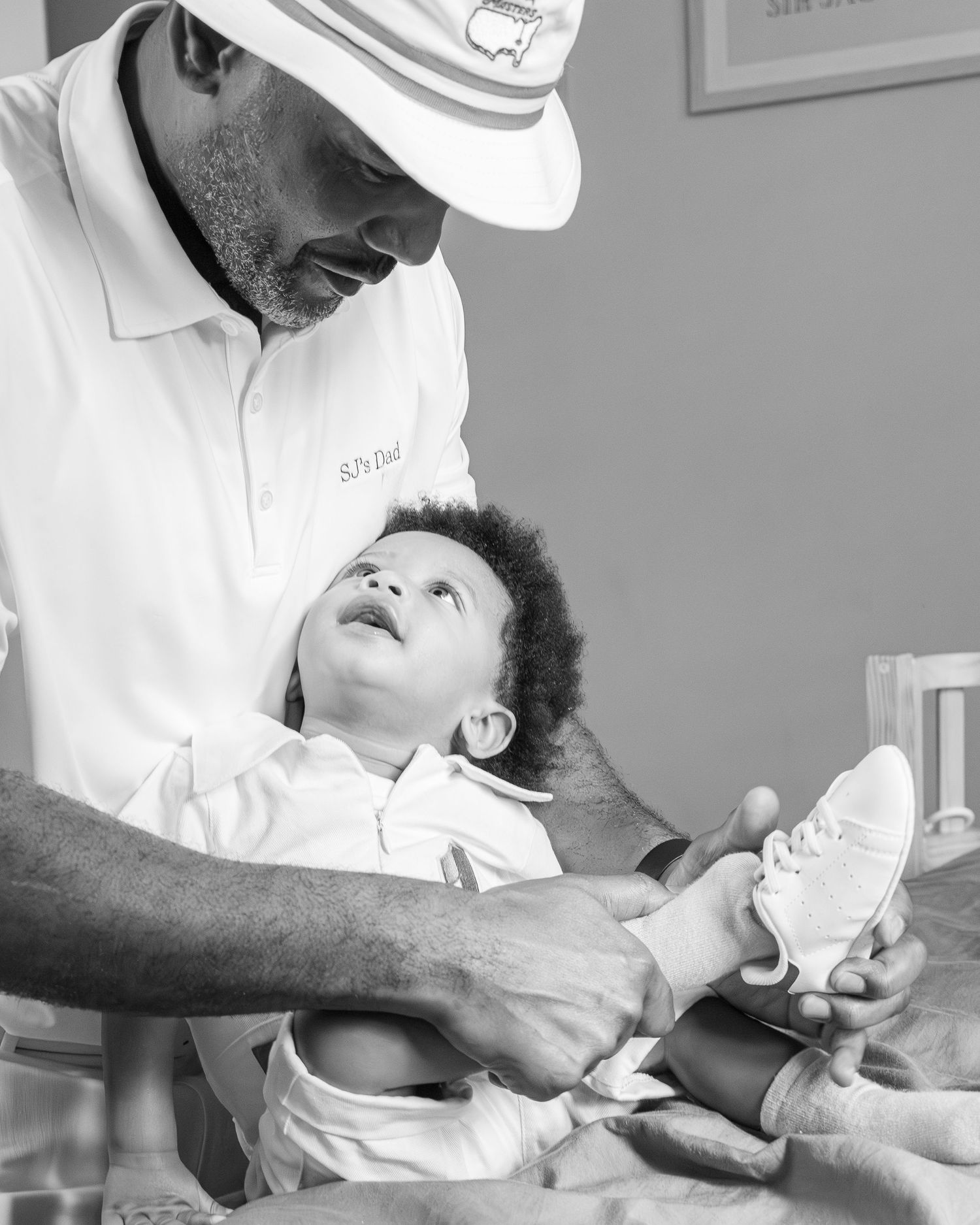 Healthcare provider performs medical examination on young child in clinical setting.