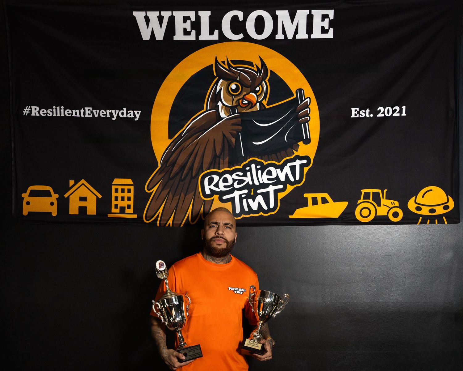 A collage of dark-themed social media banners featuring orange accents and welcome text.