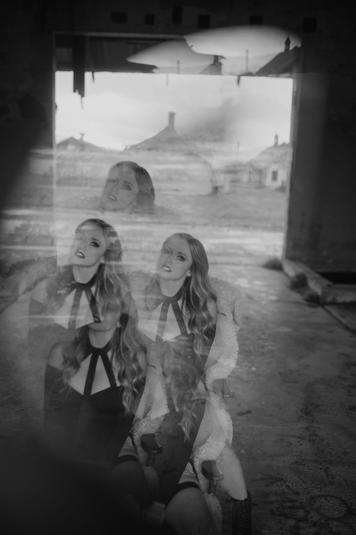 A series of faded black and white photos showing blurry figures in a dreamlike, vintage double-exposure style.