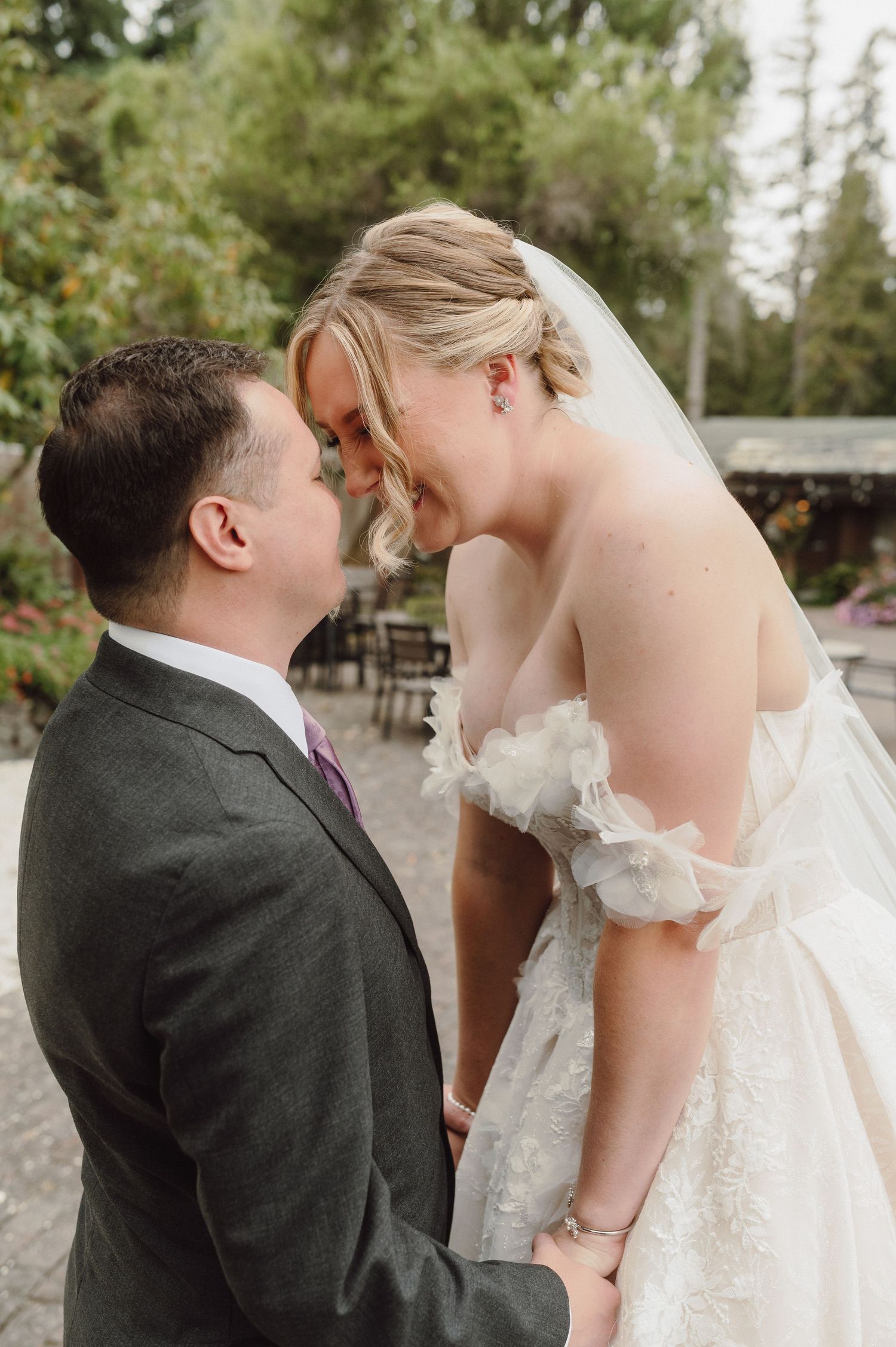 A romantic sequence of wedding photos showing a couple in formal attire sharing intimate moments outdoors.