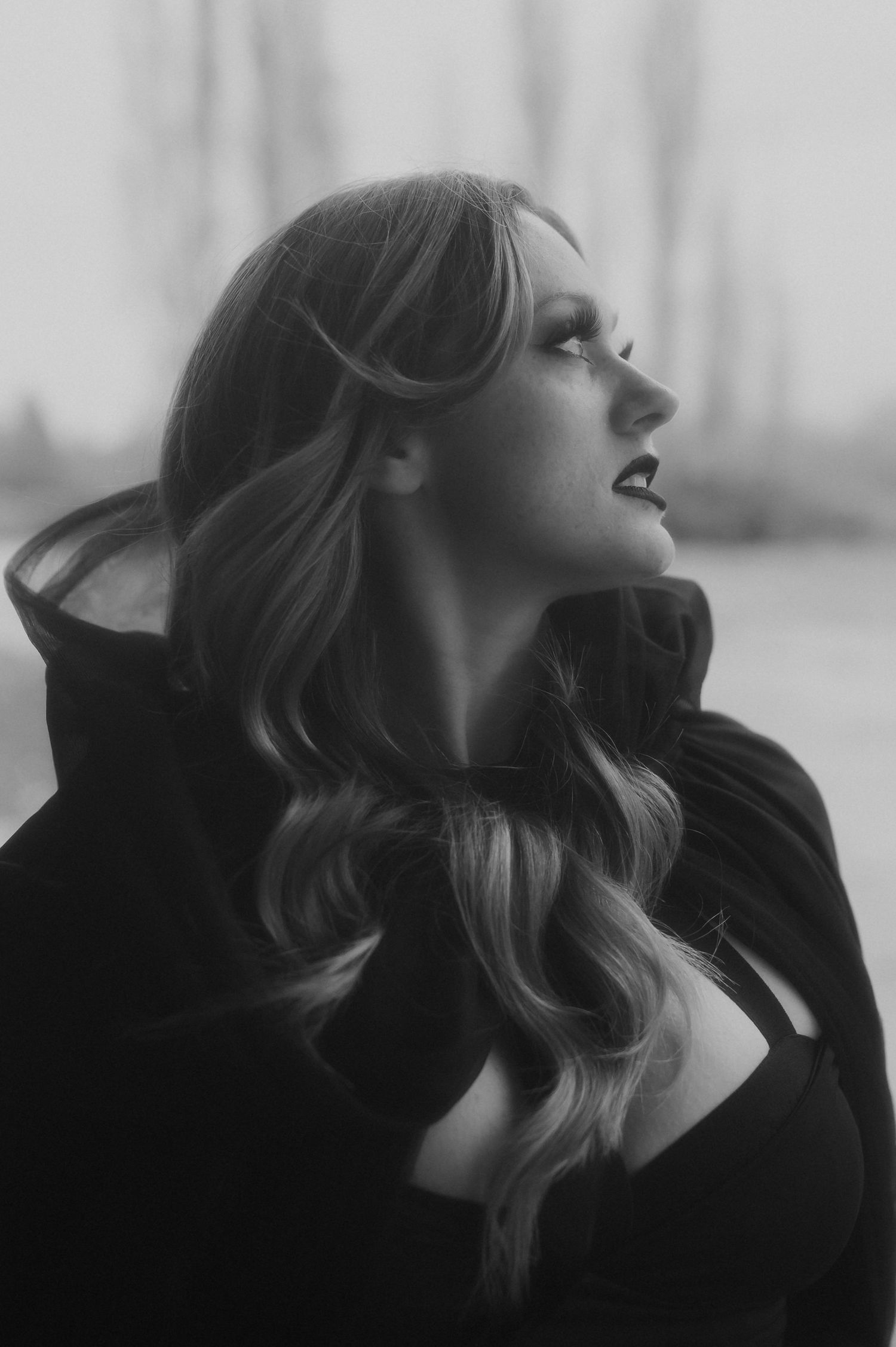 A series of six black and white profile portraits showing a dramatic side view against a blurred background.
