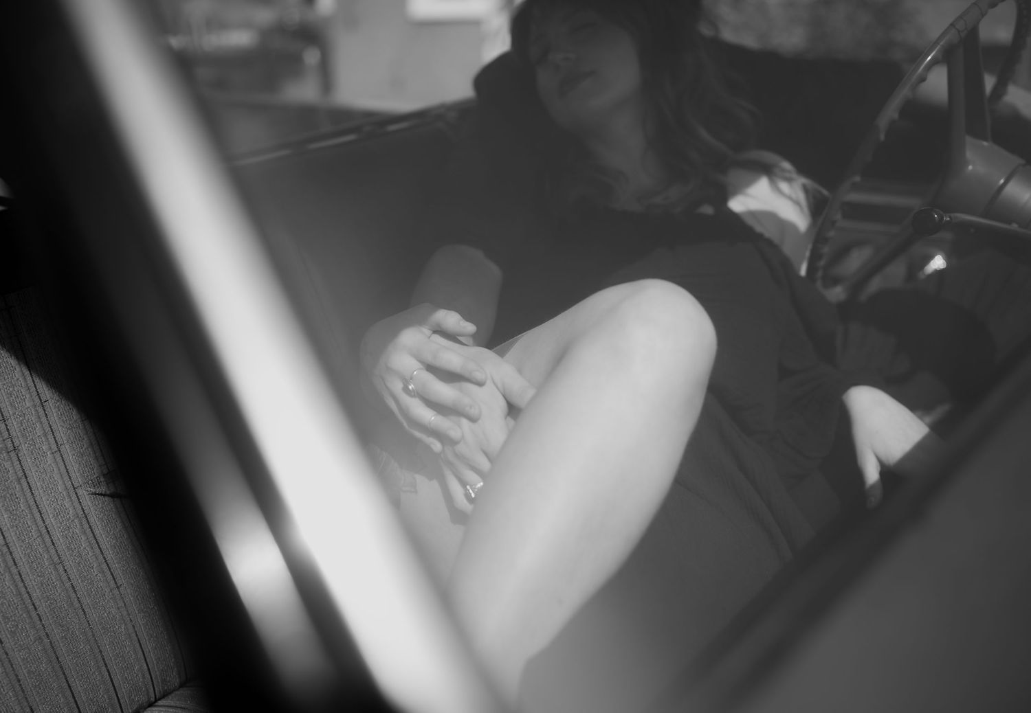 Black and white photo sequence showing someone writing in a notebook or journal at a desk.