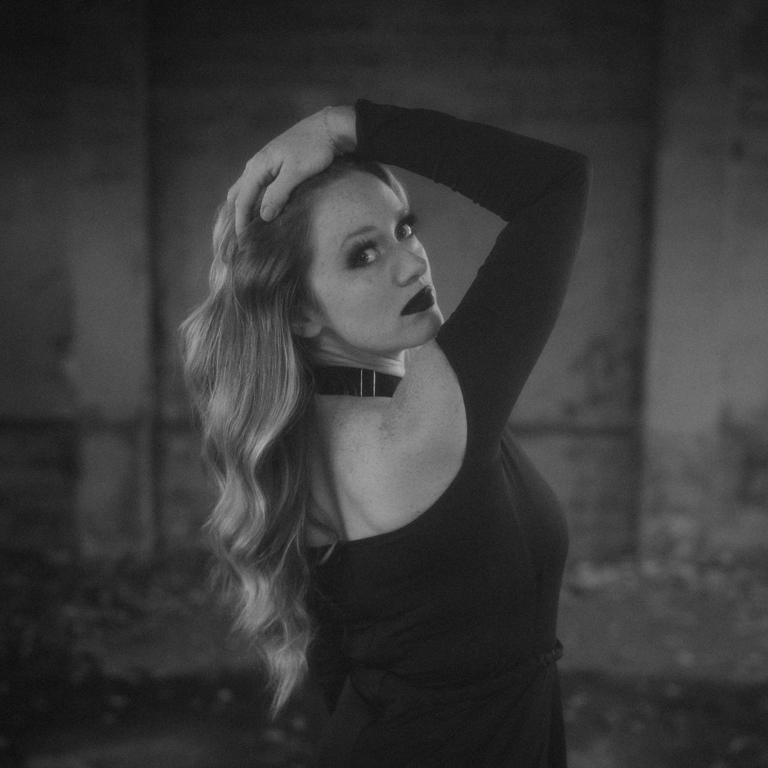 A dramatic black and white portrait sequence showing a contrasting artistic shot of a person with blonde hair.