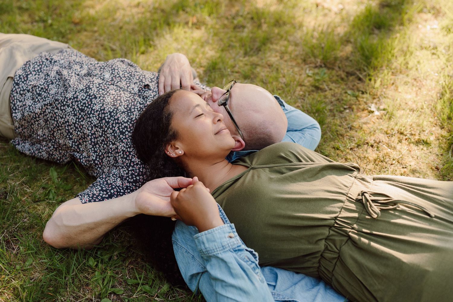 A sequence of images showing someone lying in grass enjoying a peaceful moment outdoors in natural sunlight.