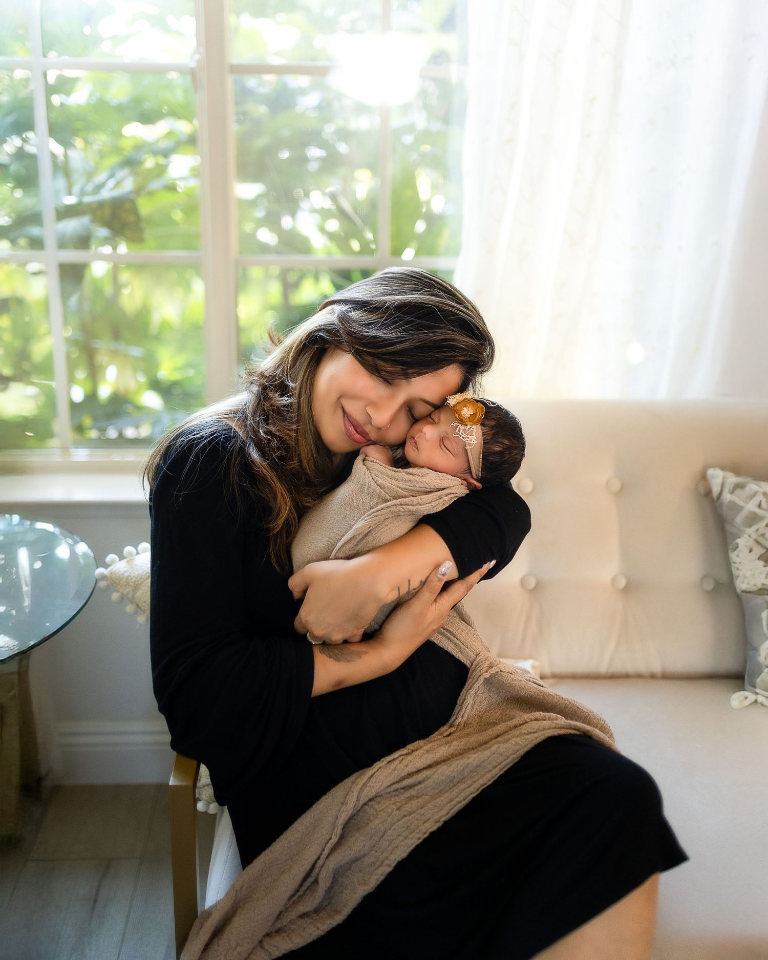 A series of photos showing someone resting peacefully on a white couch in a sunlit room.